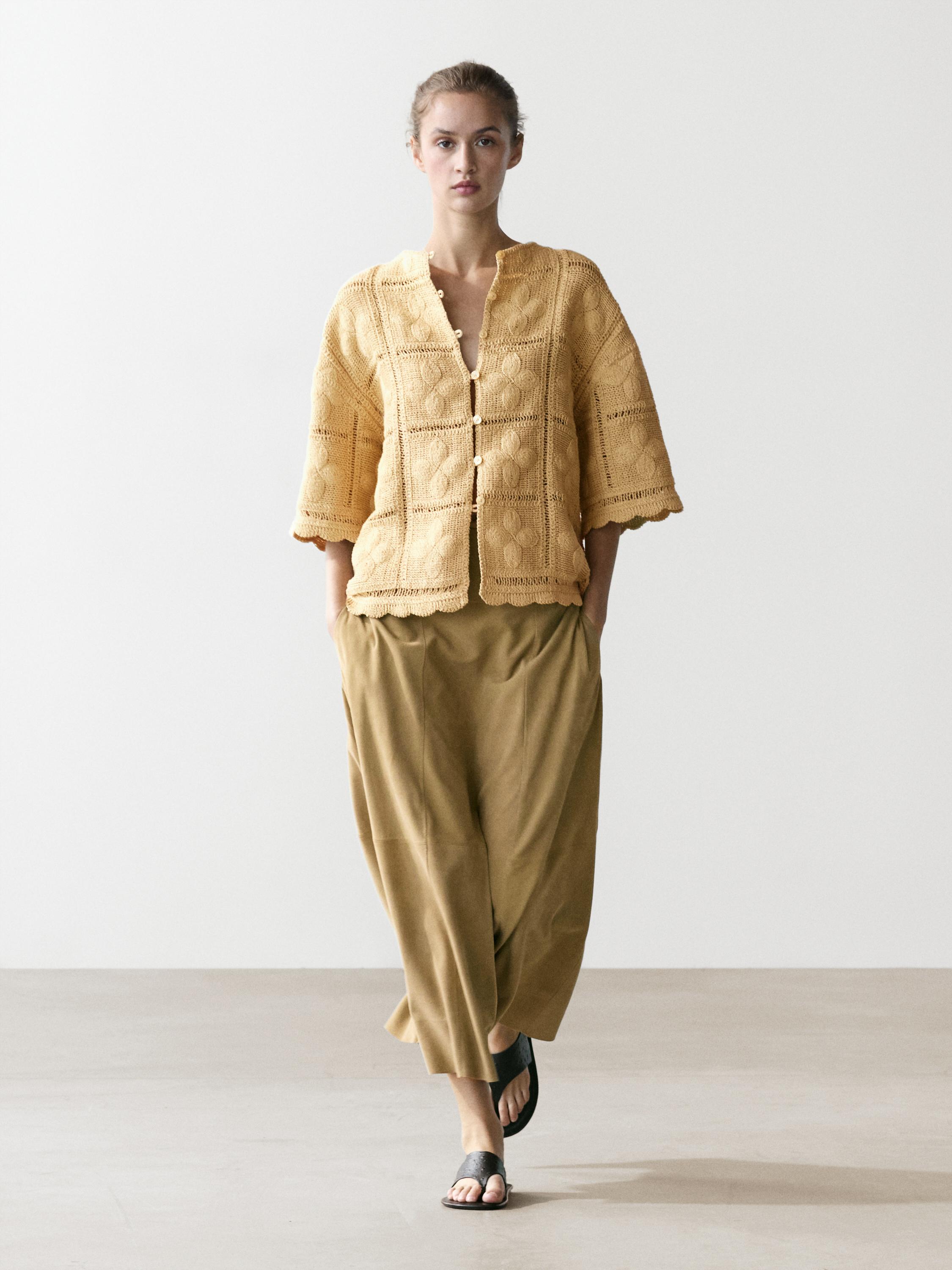 Veste en maille ajourée et crochet