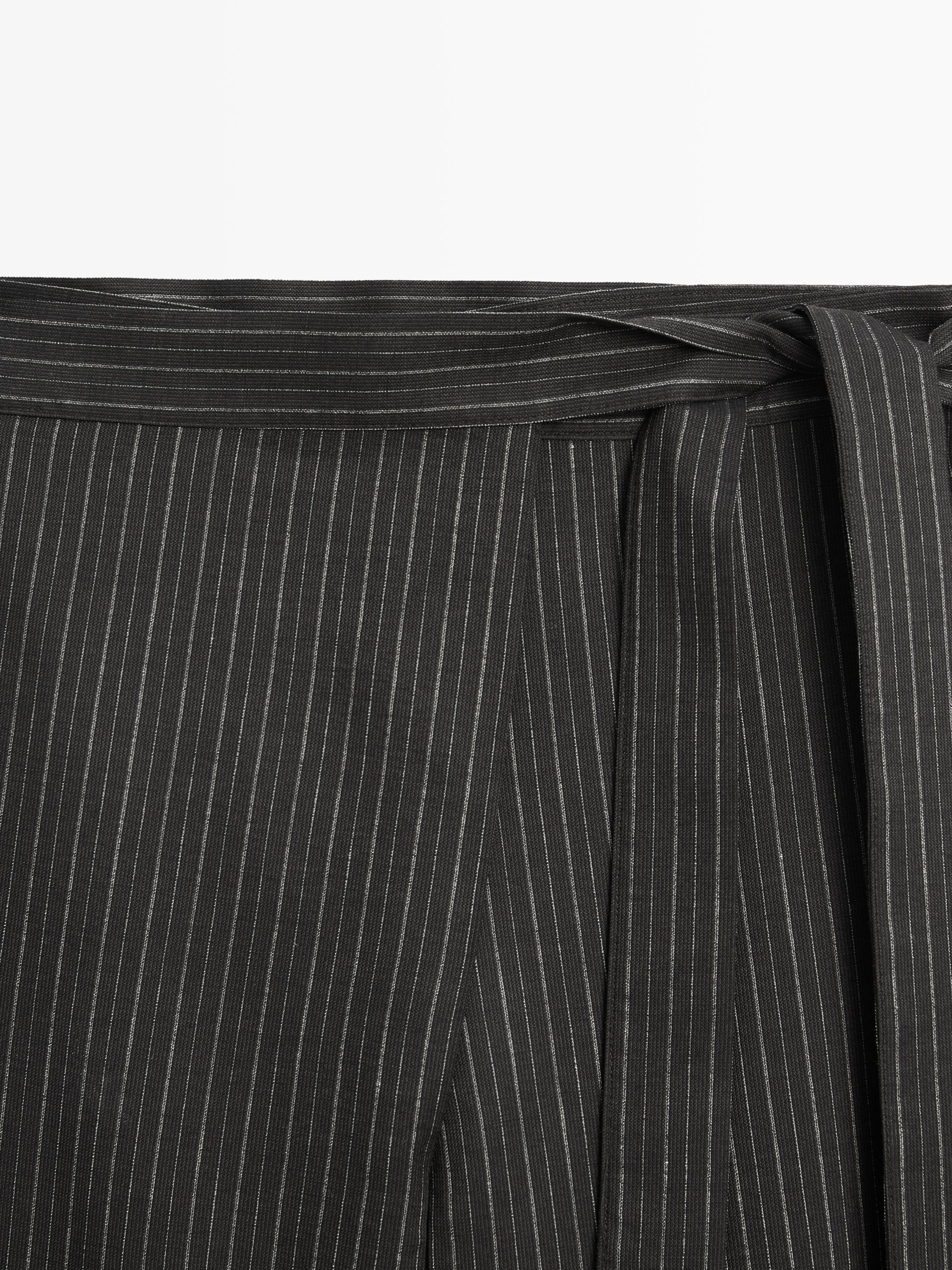 Striped trousers with wrap-style bow detail