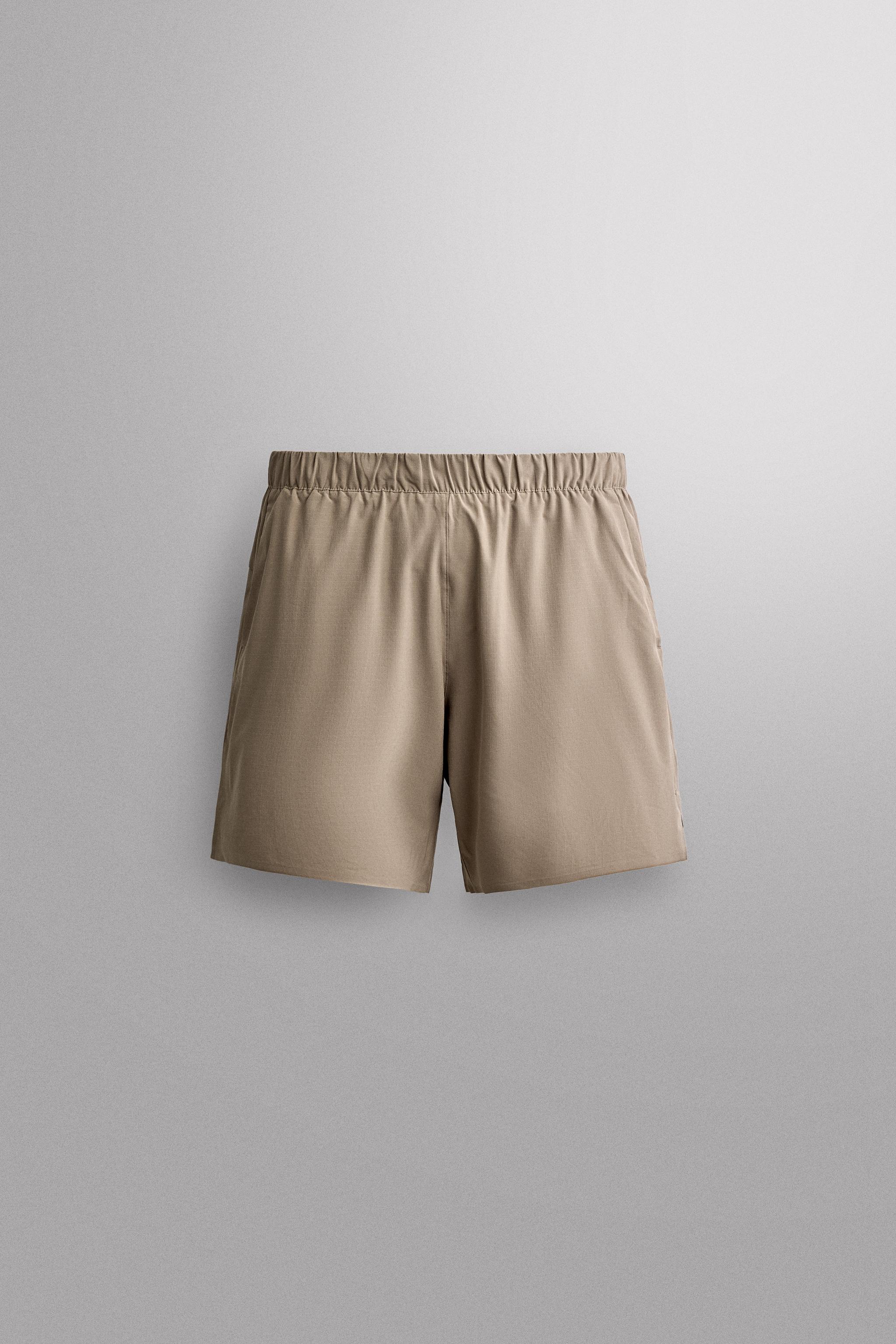 9" TRAINING SHORTS — Light brown