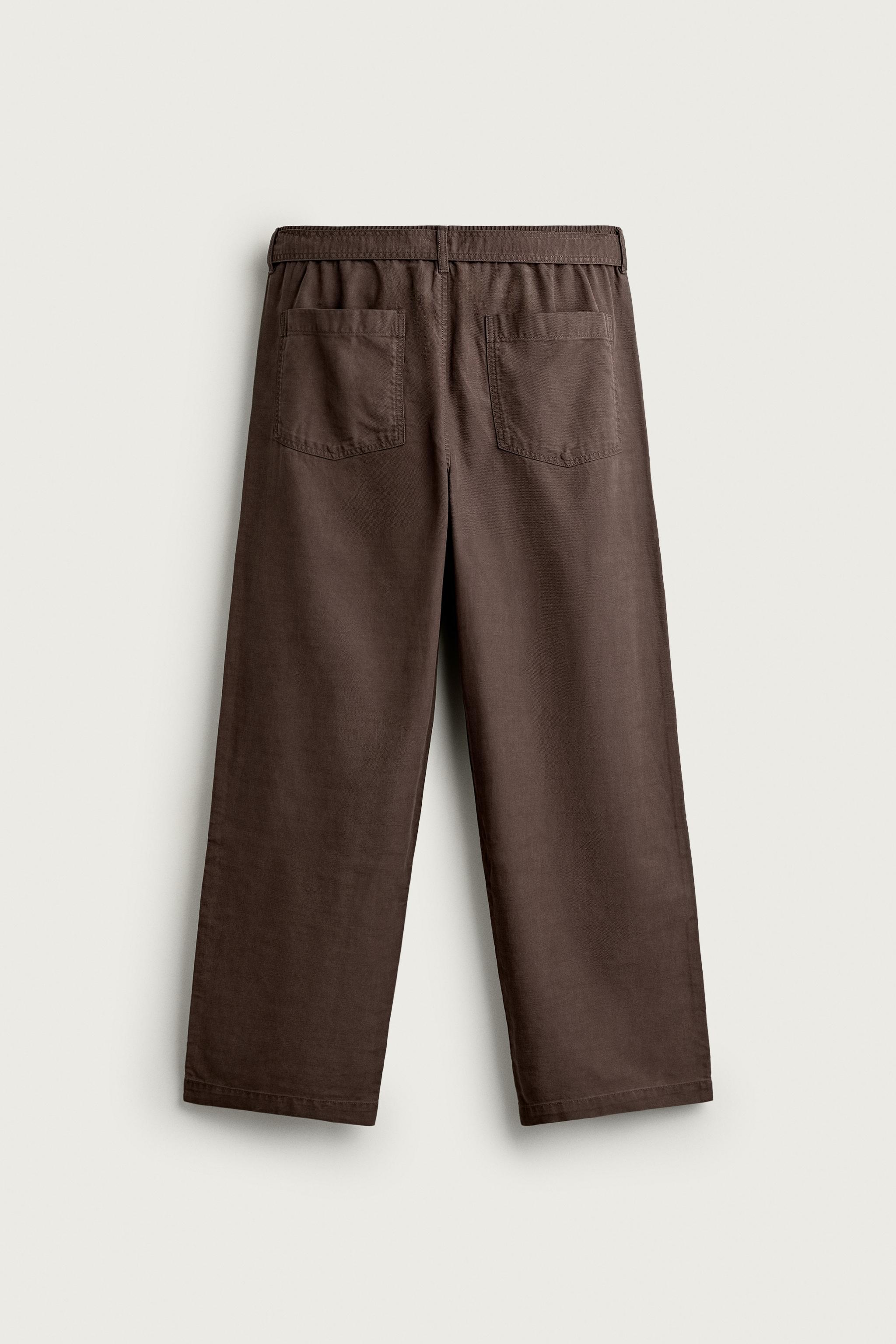 RELAXED FIT BELTED PLEATED PANTS
