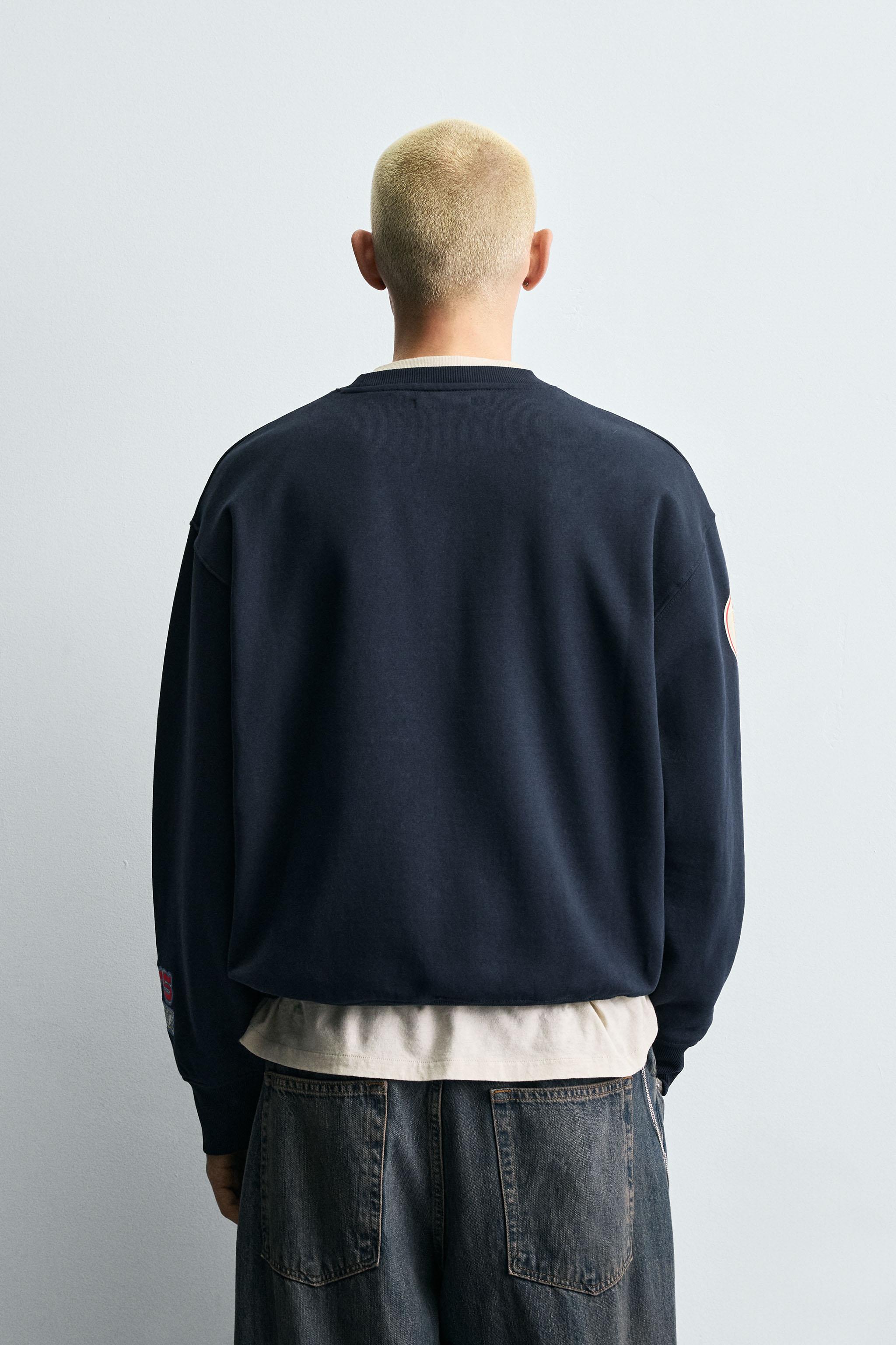 CREW NECK PATCH SWEATSHIRT