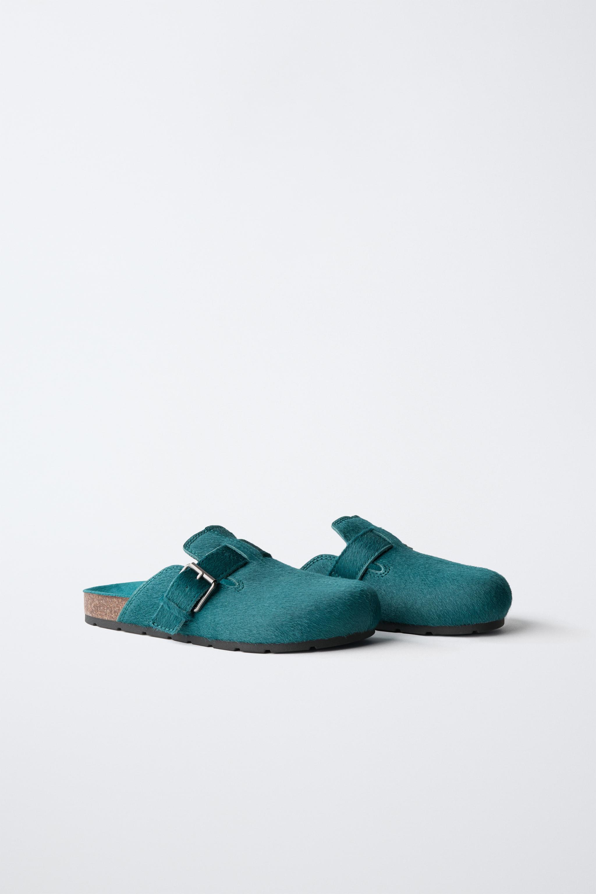 SABOTS EN CUIR À BOUCLE