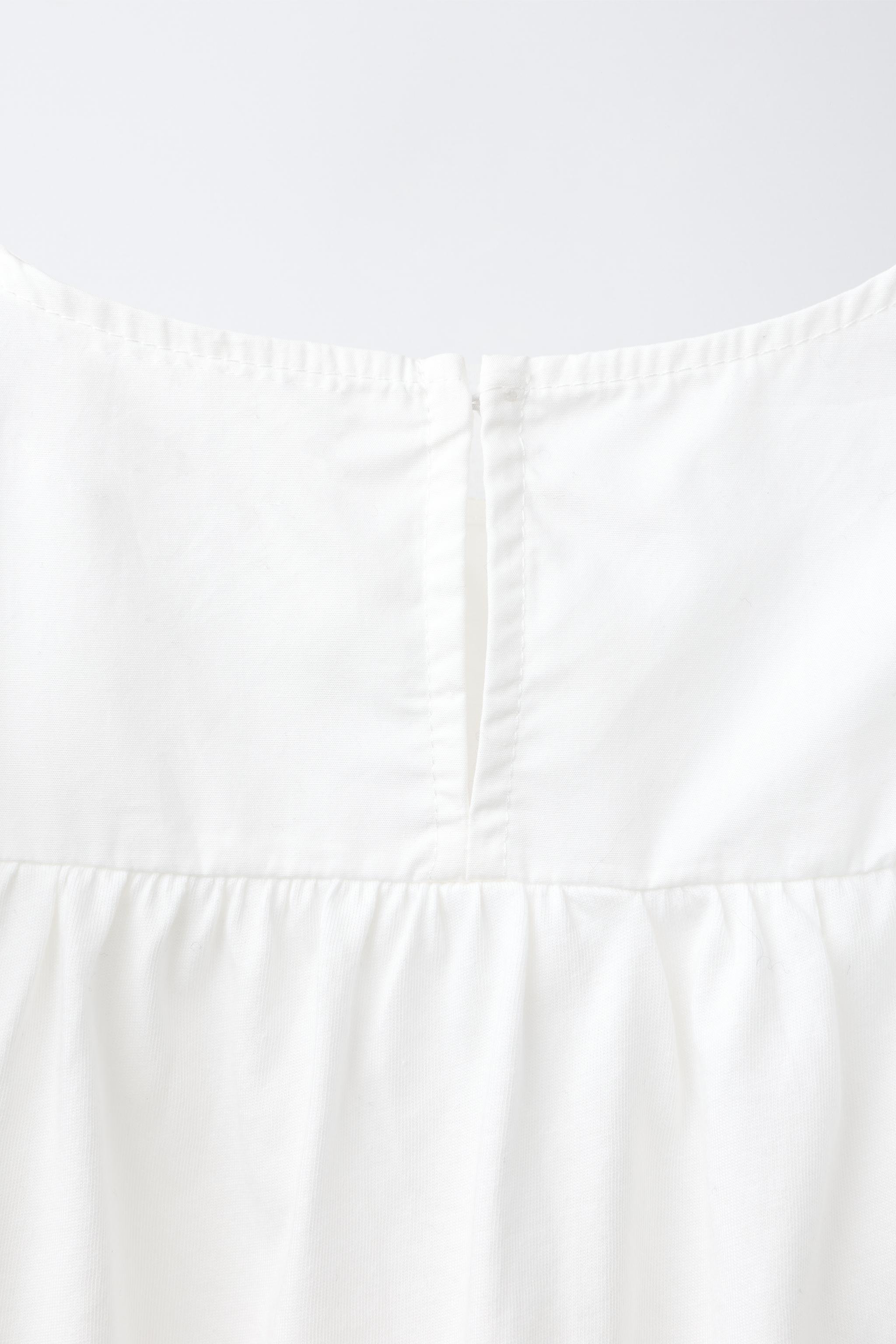 STUDDED RUFFLE T-SHIRT