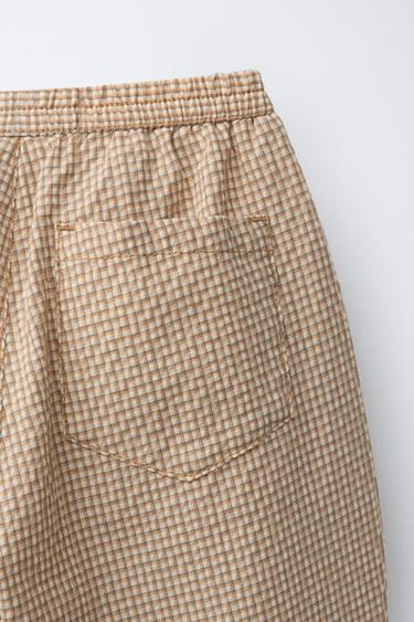 PANTALÓN BALLOON SEERSUCKER CUADROS - Crudo medio de Zara