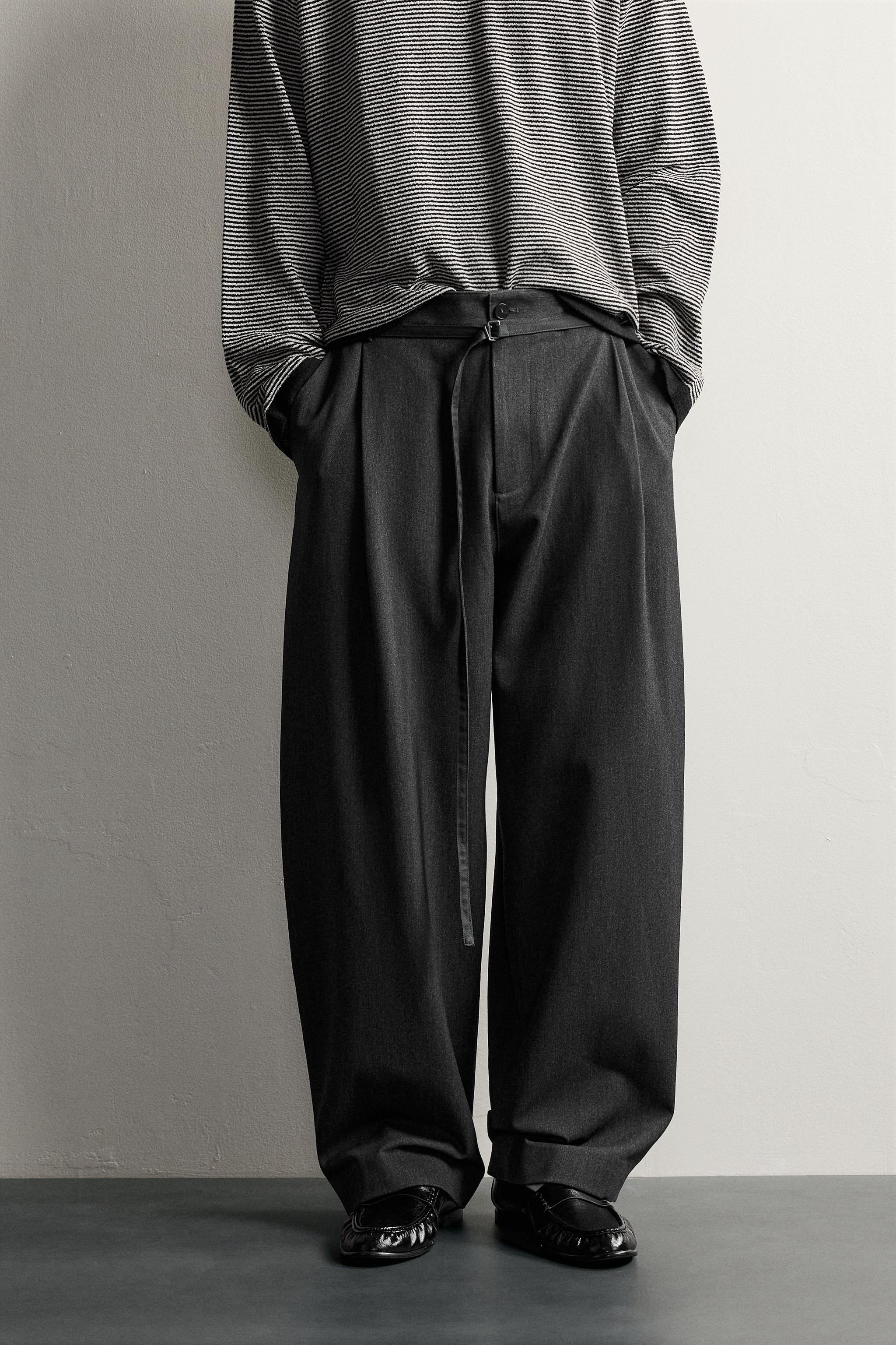 BELTED PLEATED BALLOON FIT PANTS