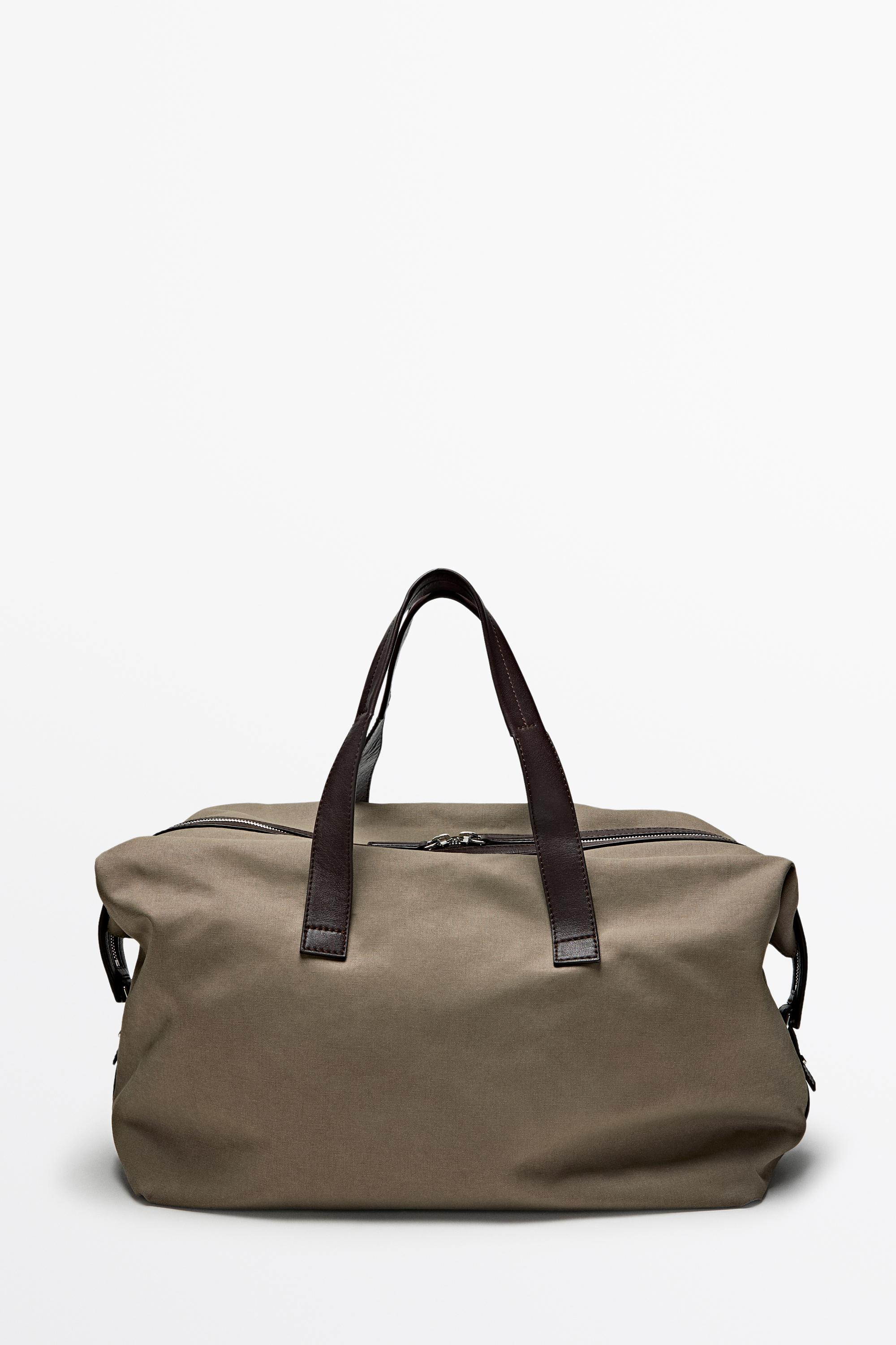 Nappa leather detail travel bag — Black gold