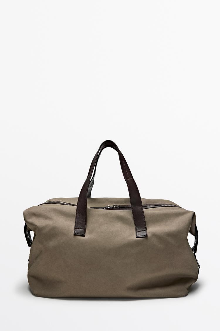 Nappa leather detail travel bag — Black gold