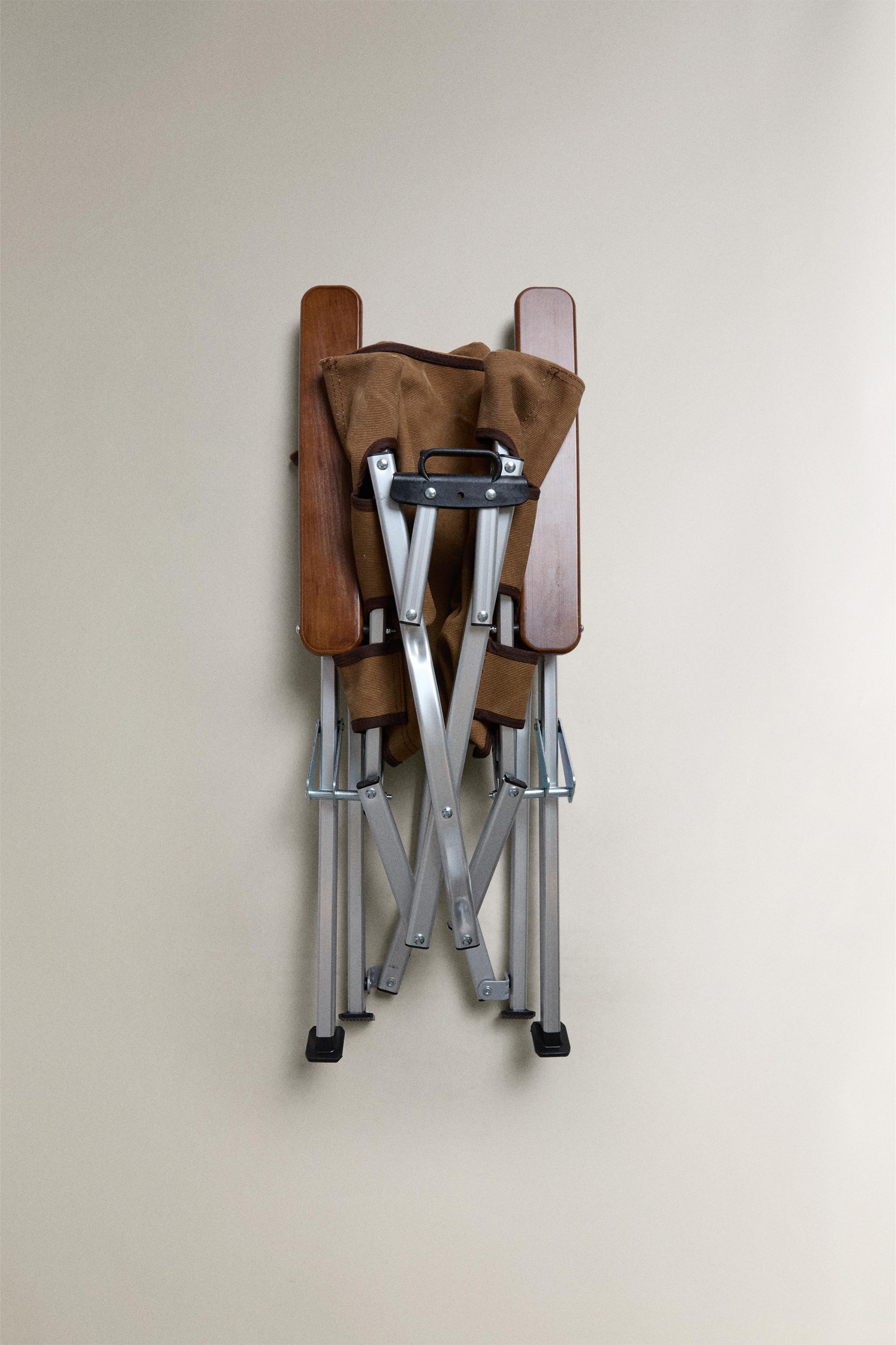 FOLDING CHAIR WITH ARMRESTS AND HANDLE - Tostado | ZARA Estados