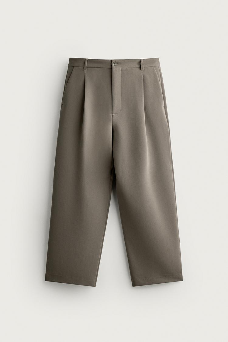 RELAXED FIT PLEATED TROUSERS