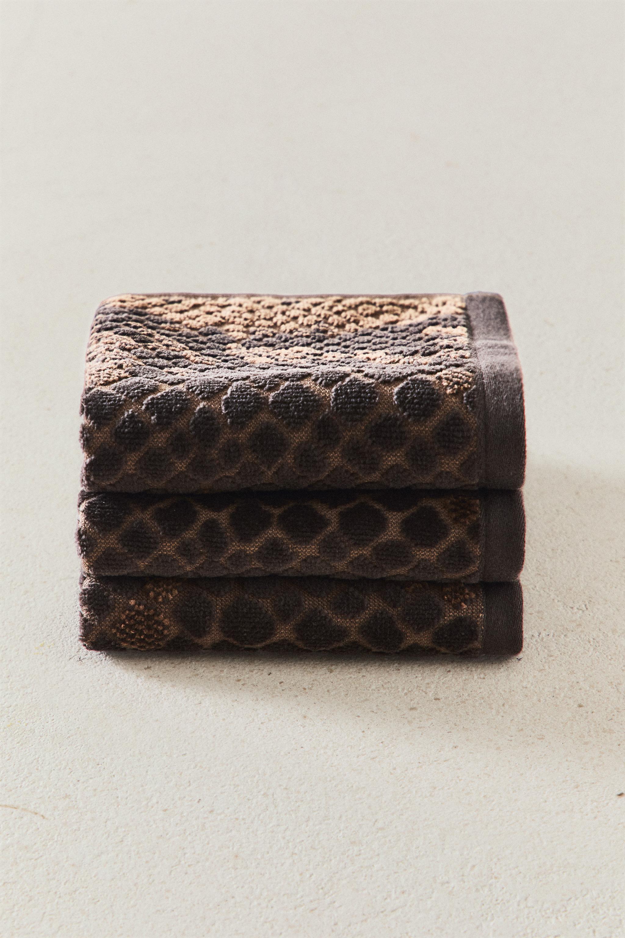 PACK OF VELOUR ANIMAL PRINT HAND TOWELS (PACK OF 3) — Brown
