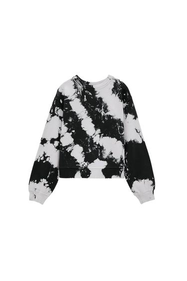 Long-sleeved sweatshirt with black and white tie-dye design on a white background.