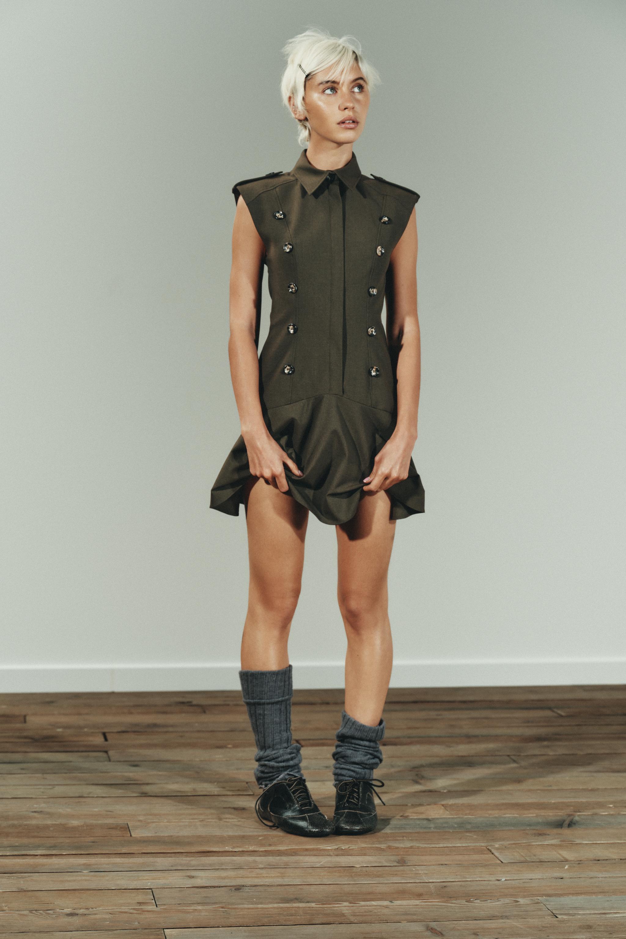 SHORT DRESS WITH SHOULDER PADS AND RUFFLES