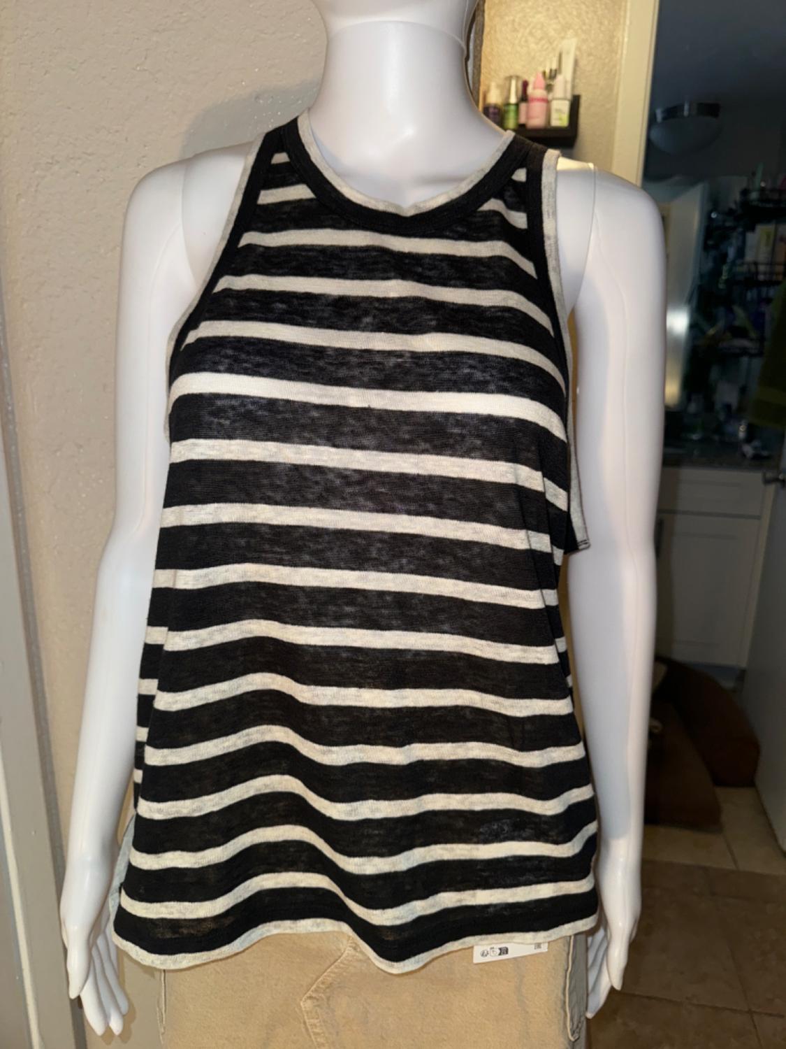 Black and white striped sleeveless crew neck t-shirt set.