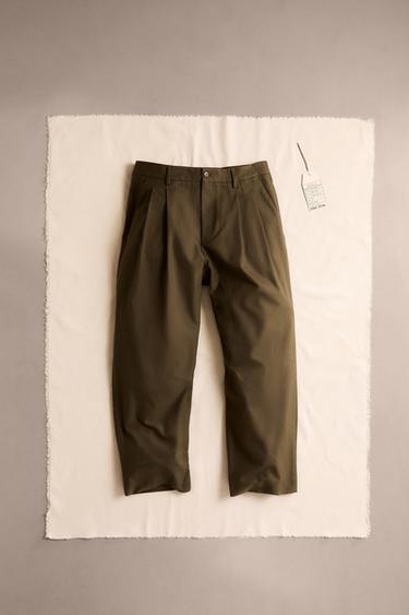 RELAXED FIT PLEATED TROUSERS - Khaki by Zara - Image 0