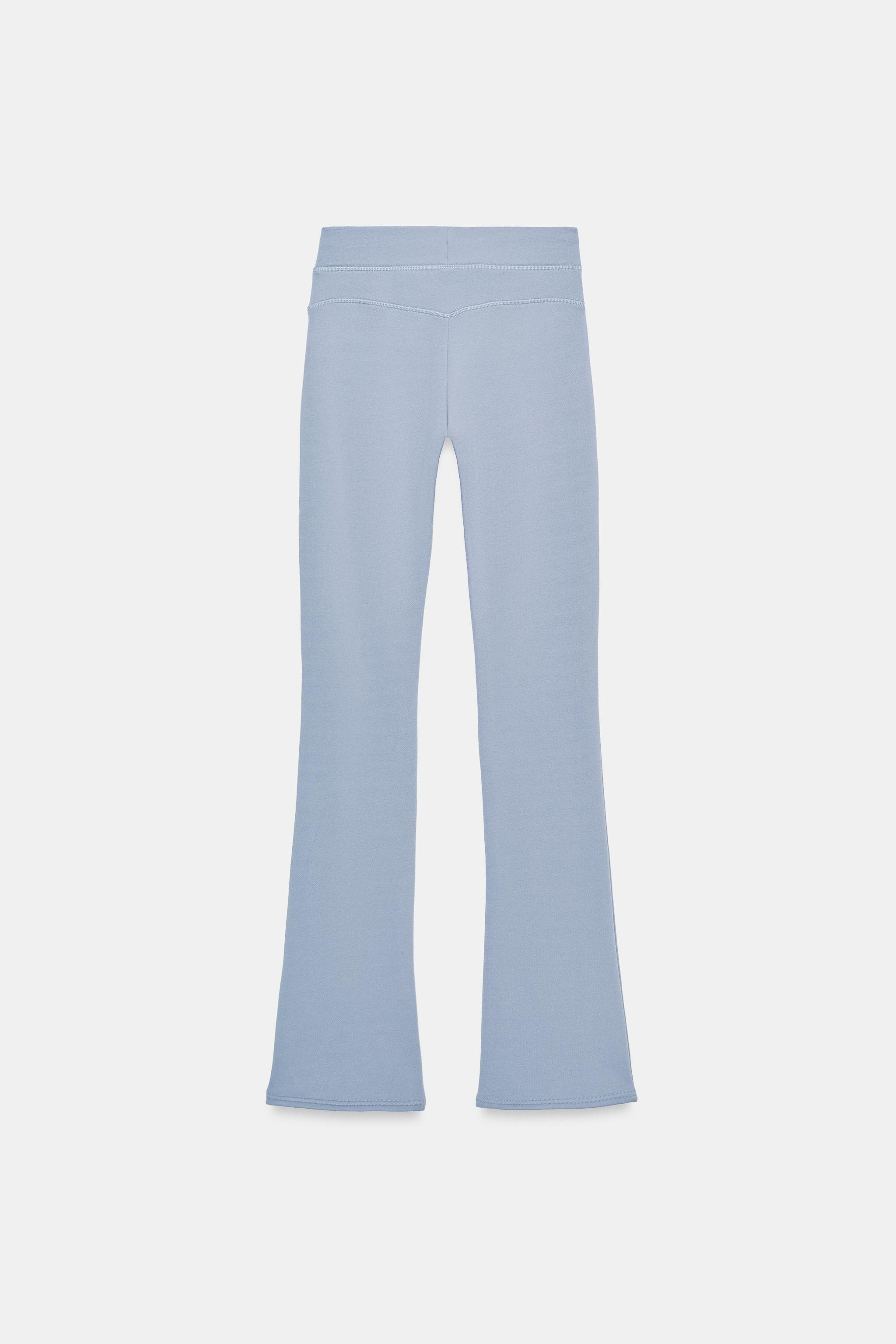 WASHED-EFFECT FLARE TROUSERS