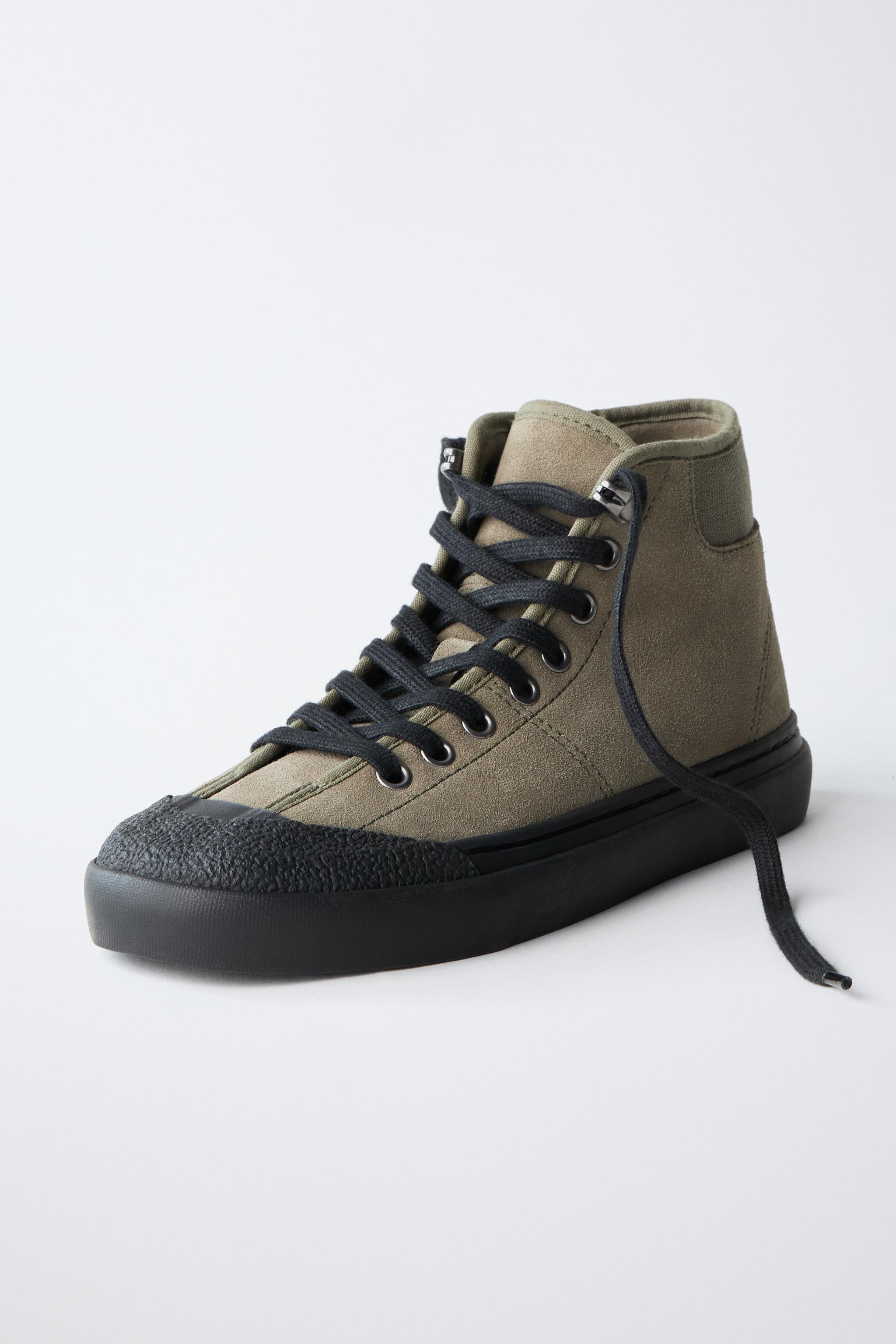 BASKETS MONTANTES EN CUIR