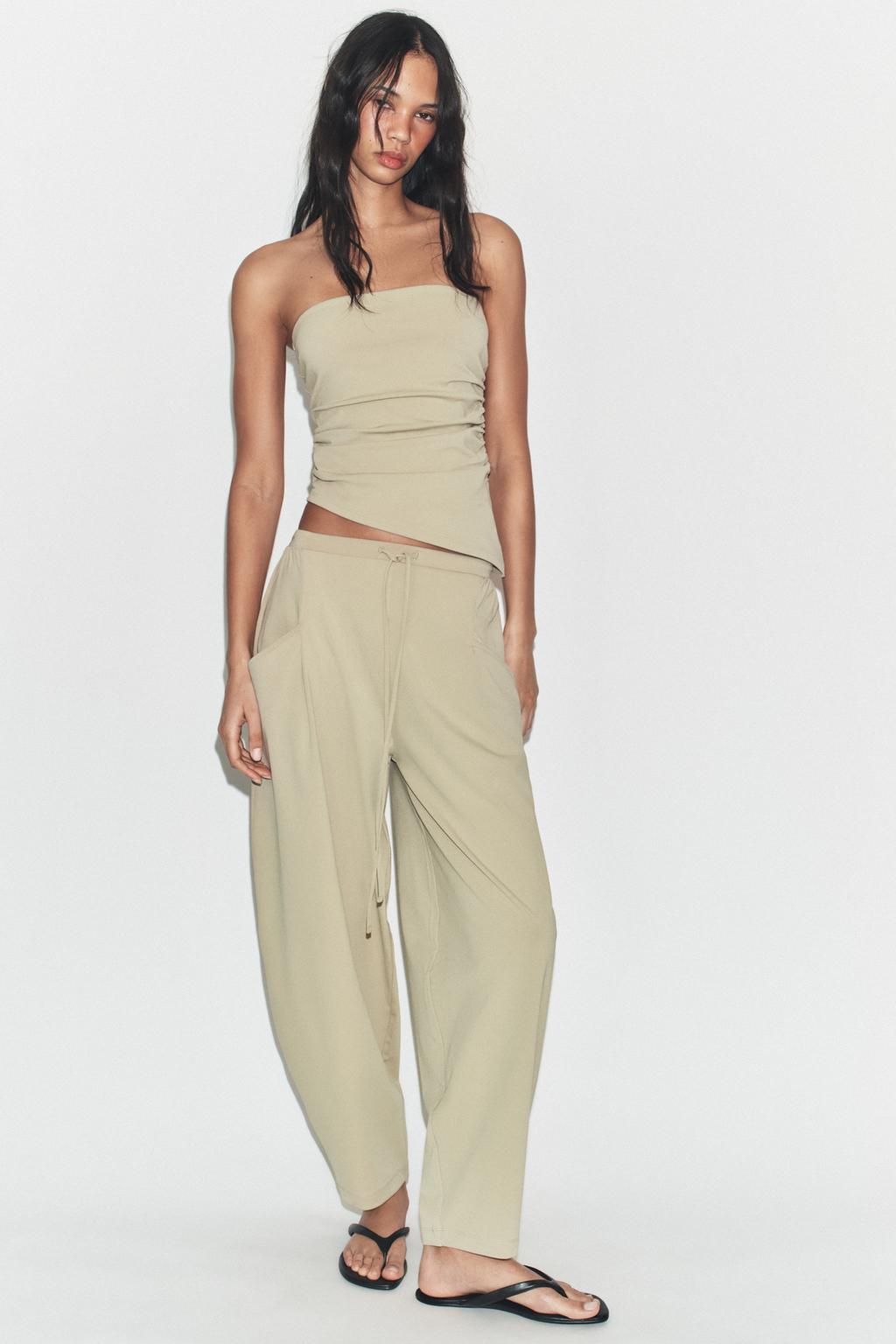 TEXTURED PANTS WITH POCKETS - image 2