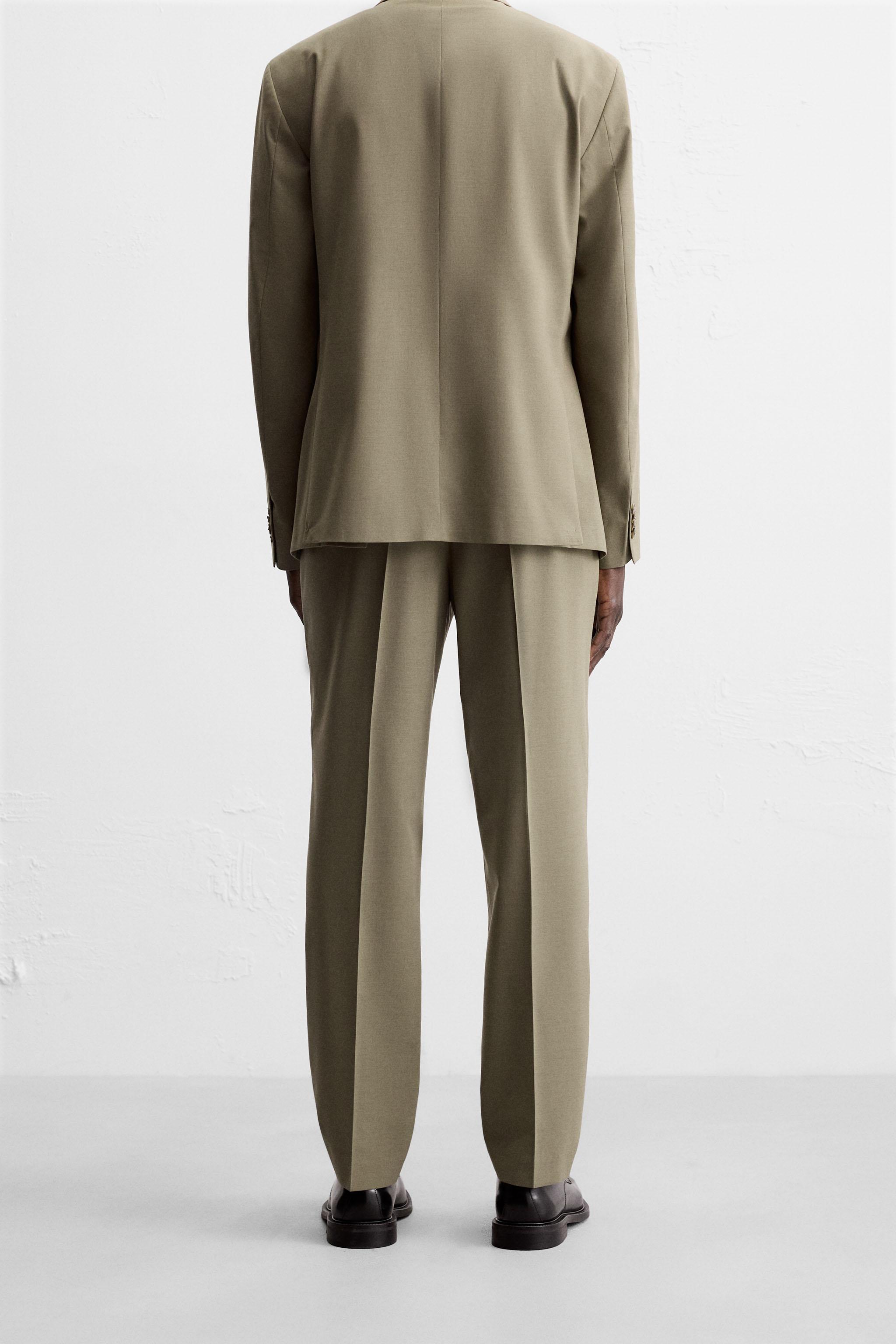 TEXTURED SUIT PANTS