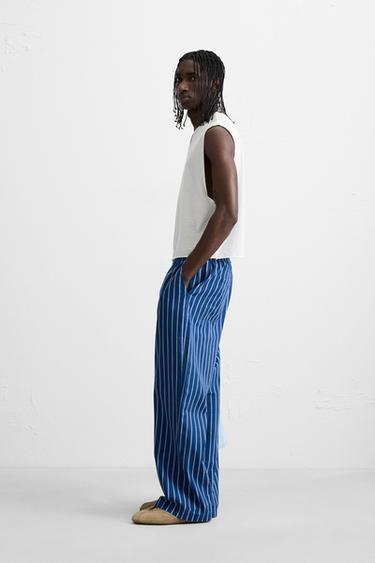STRIPED RELAXED FIT TROUSERS - Stripes by Zara - Image 3