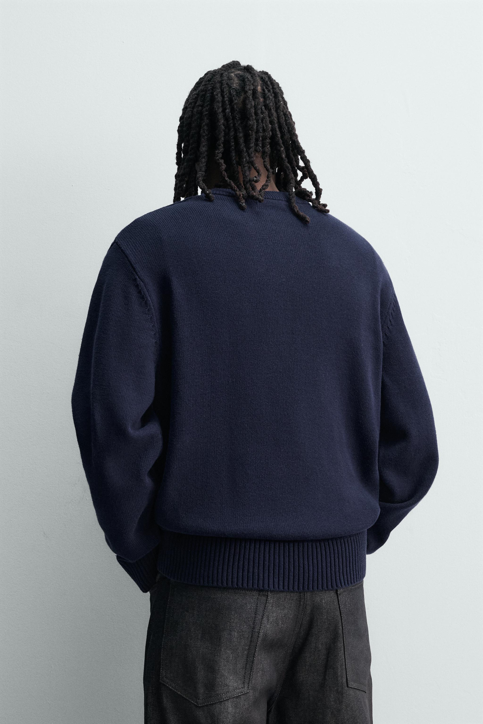 PULL AVEC INSCRIPTION BRODÉE