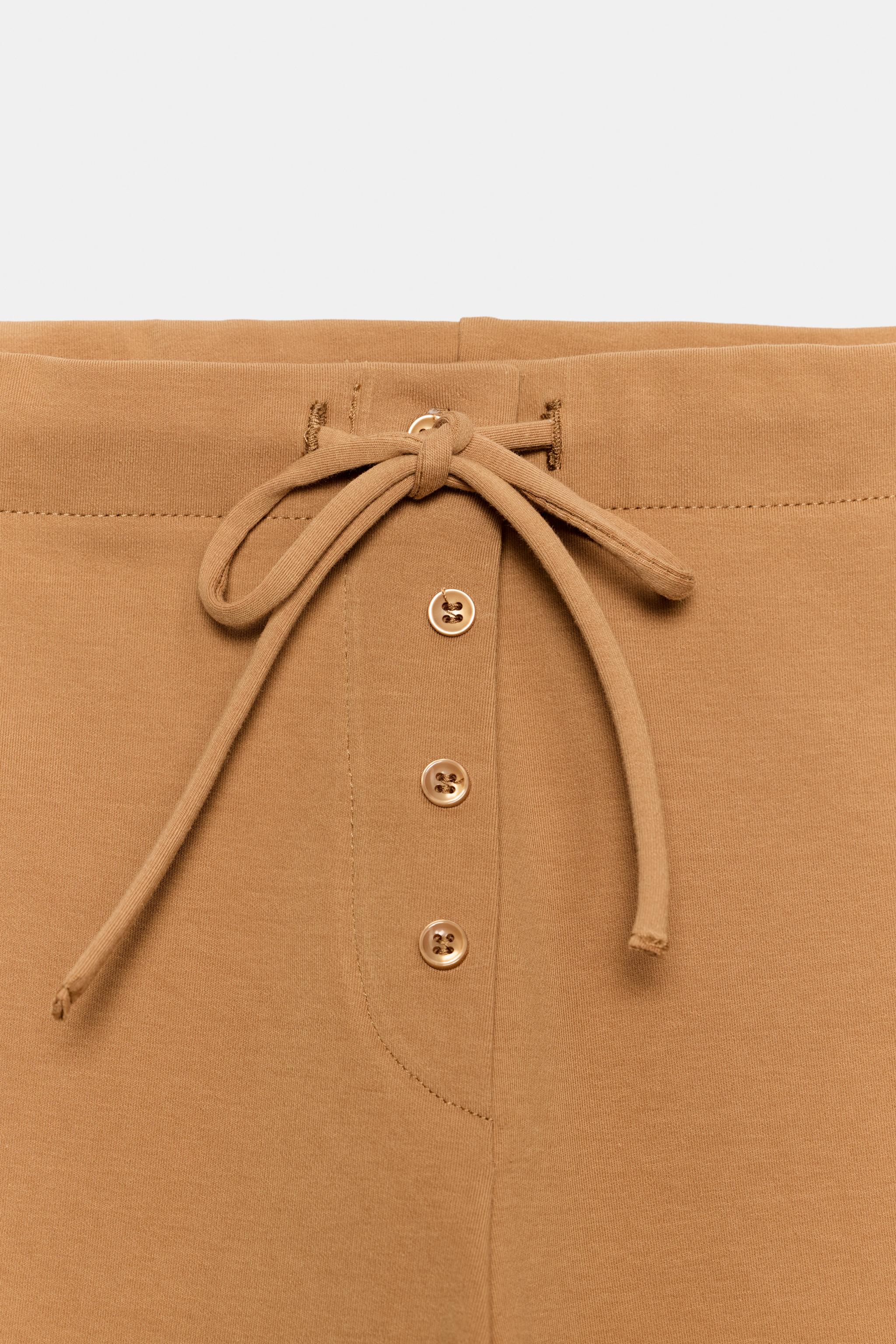 INTERLOCK TAPERED PANTS