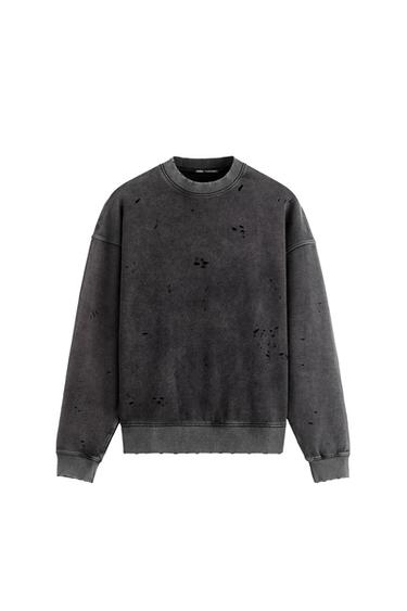 FADED SWEATSHIRT WITH RIPS
