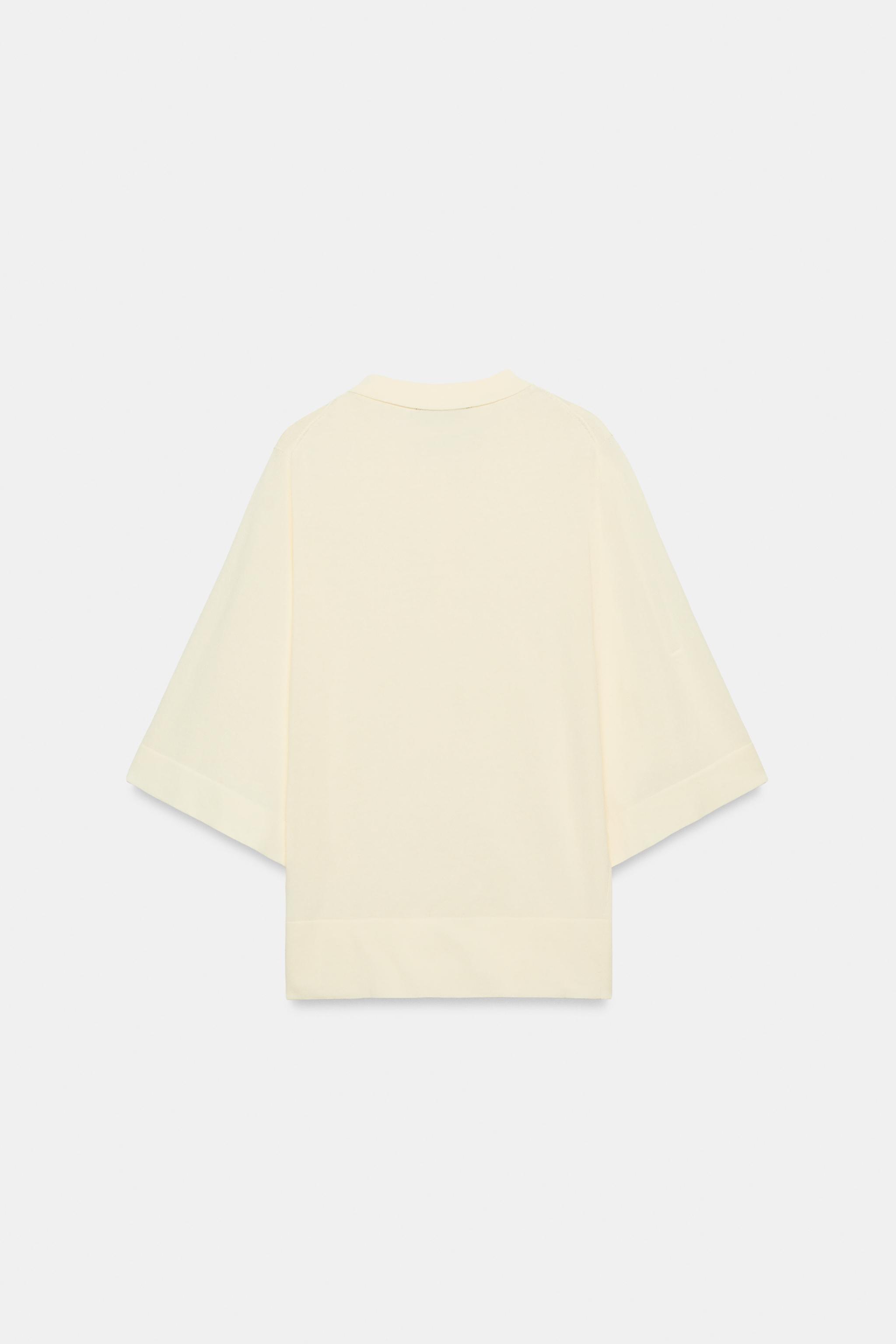 POLO EN MAILLE À MANCHES TROIS-QUARTS