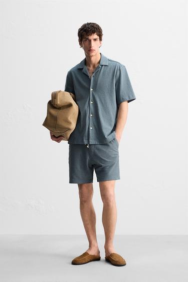 BERMUDES RELAXED FIT AMB TEXTURA - Blau / Acer de Zara - Imatge 0