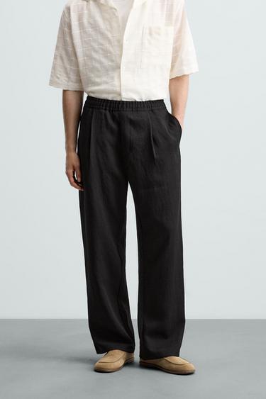 FLOWING TROUSERS WITH PLEATS - Black by Zara