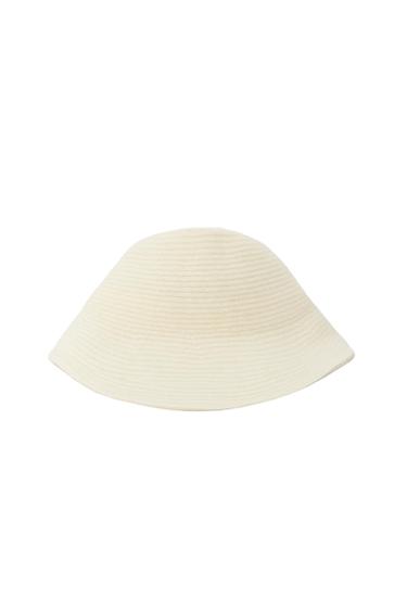 Ribbed knit hat in ecru on a white background.