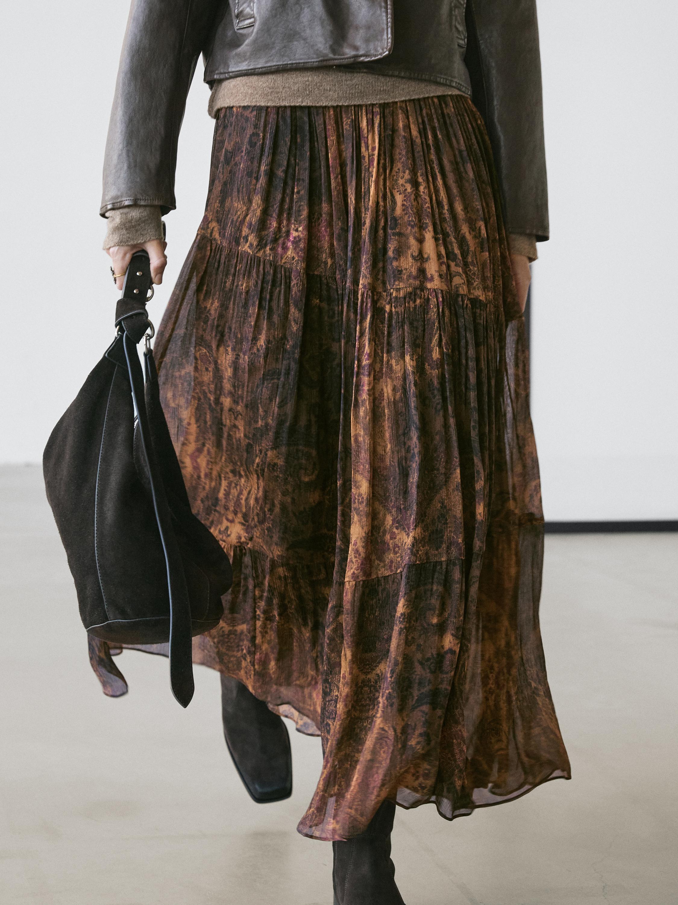 Flowing asymmetric midi skirt