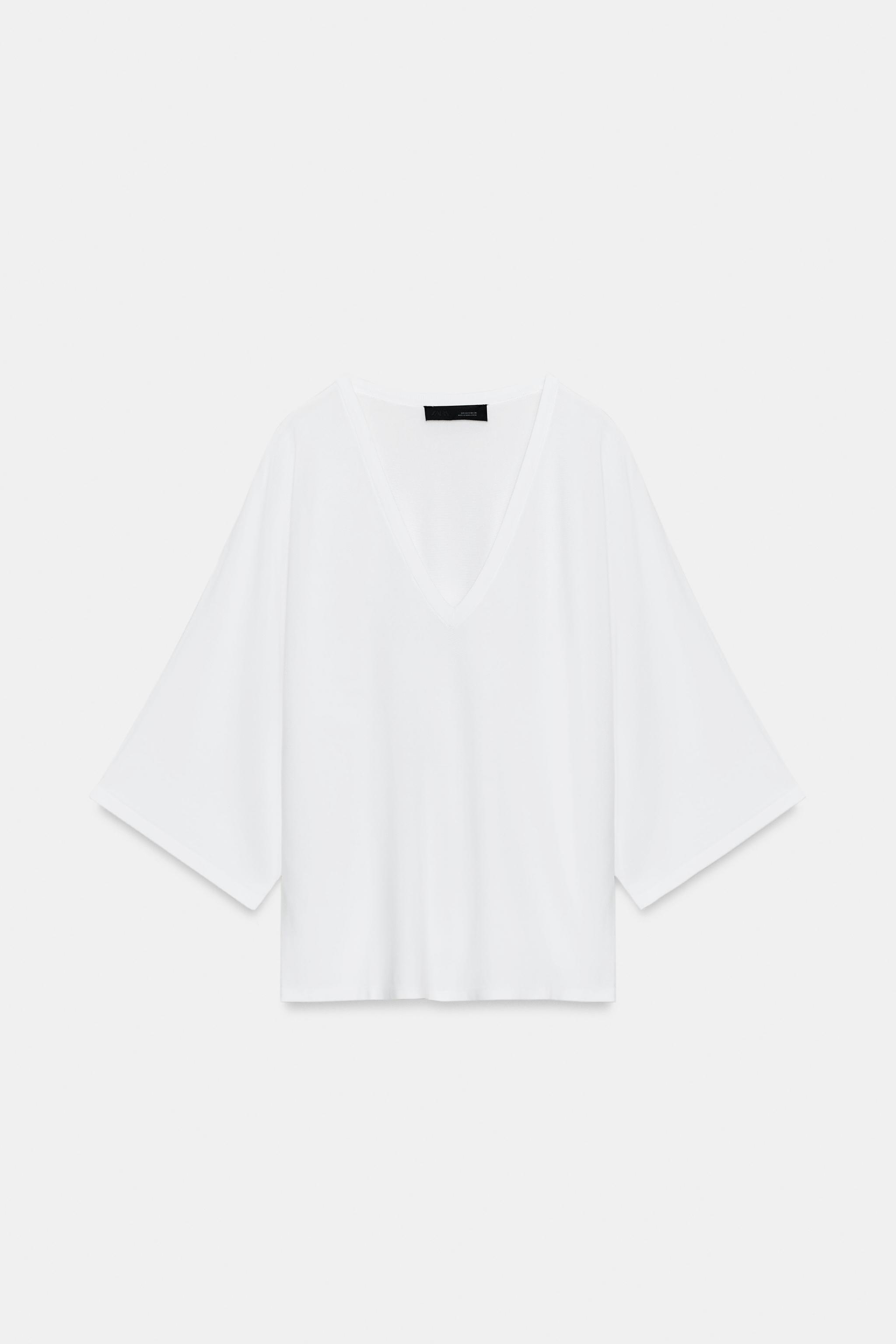 PULL EN MAILLE FLUIDE À COL V