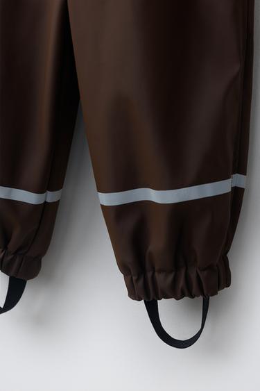WATER-RESISTANT RUBBERISED JUMPSUIT - Brown by Zara
