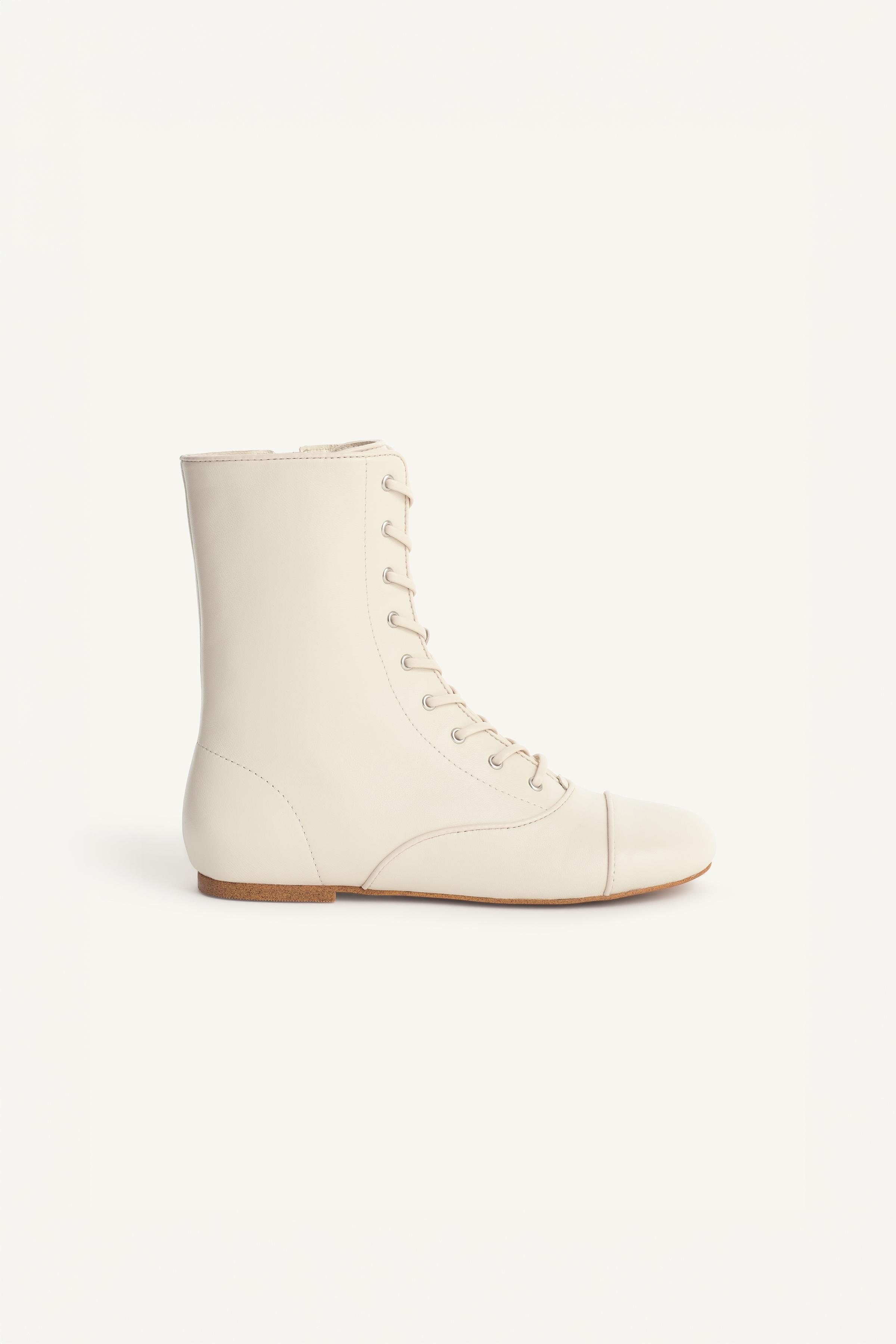 BOTTINES LACÉES EN CUIR LIMITED EDITION