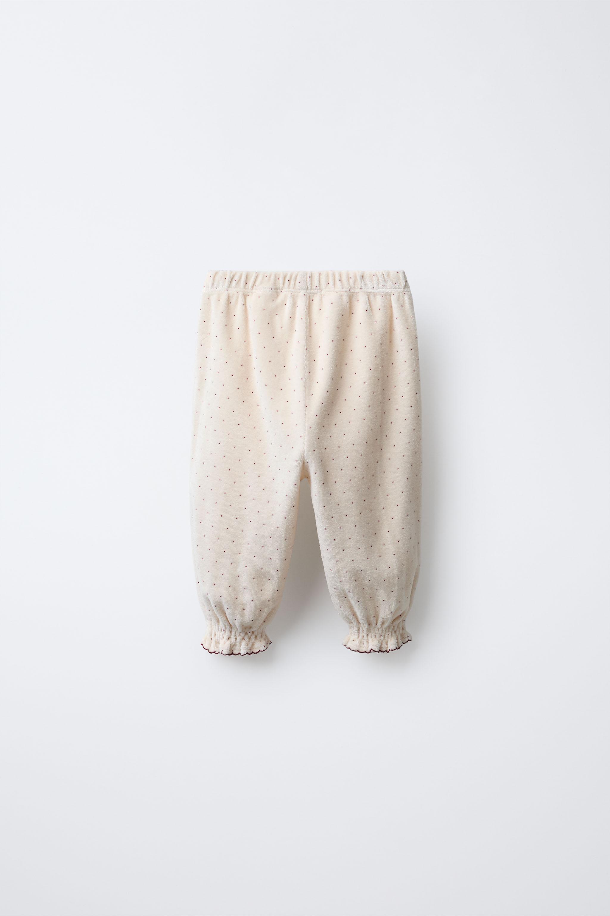 PANTALON BAGGY EN VELOURS À POIS