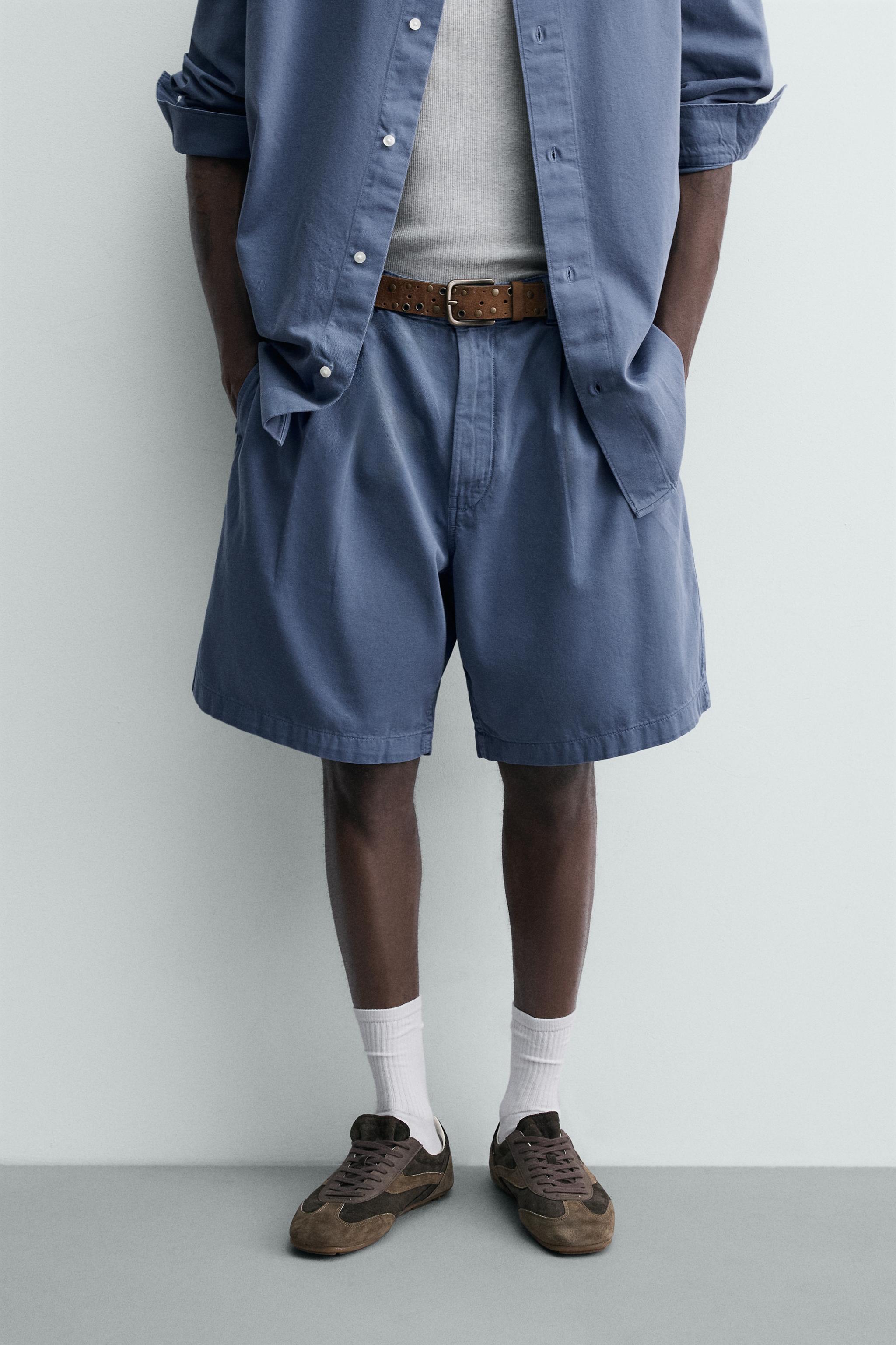 SHORT DÉLAVÉ À PLIS