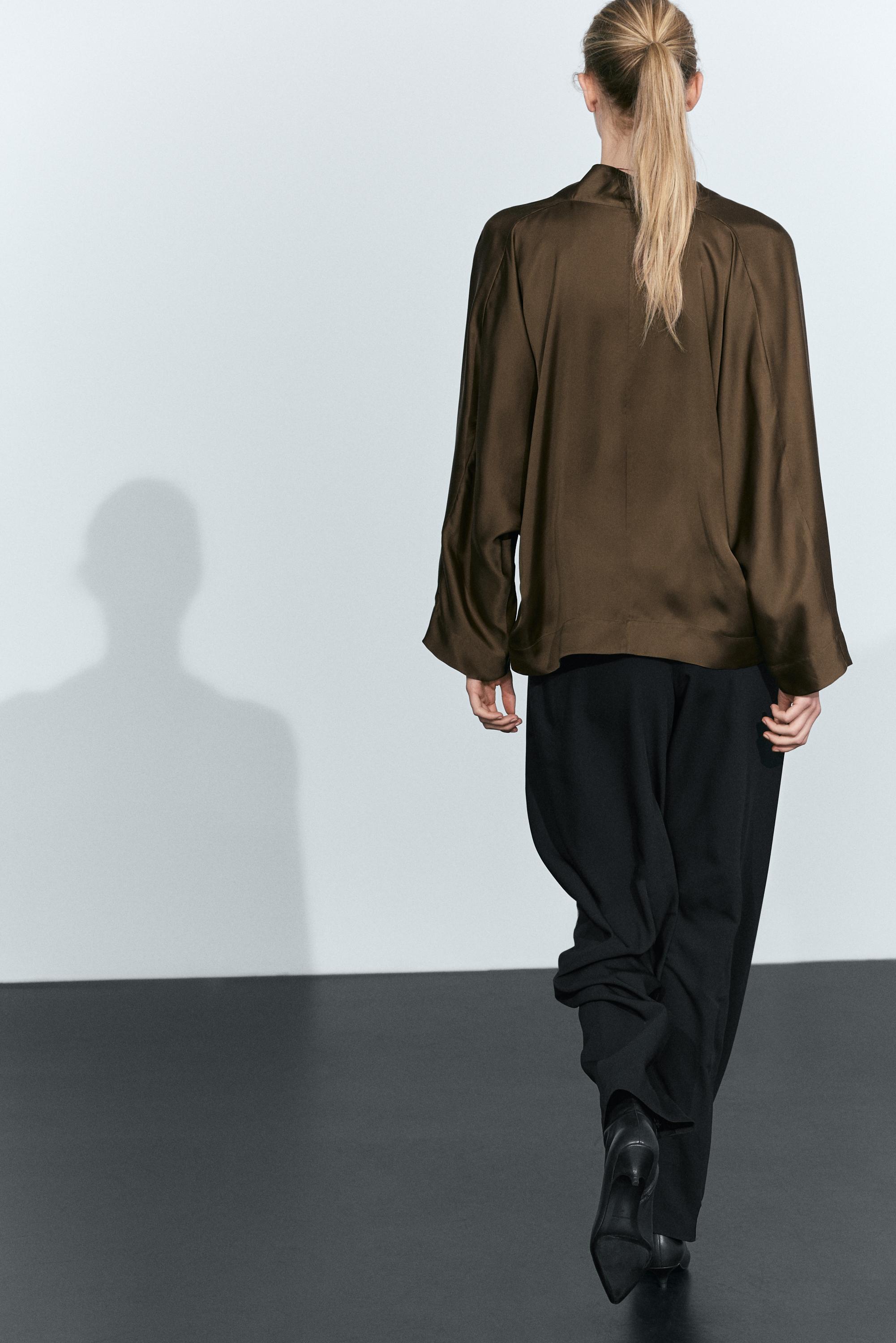Satin wrap blouse with batwing sleeves
