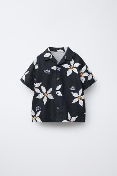 CAMICIA STAMPATA FIORI E TESTO - Nero di Zara