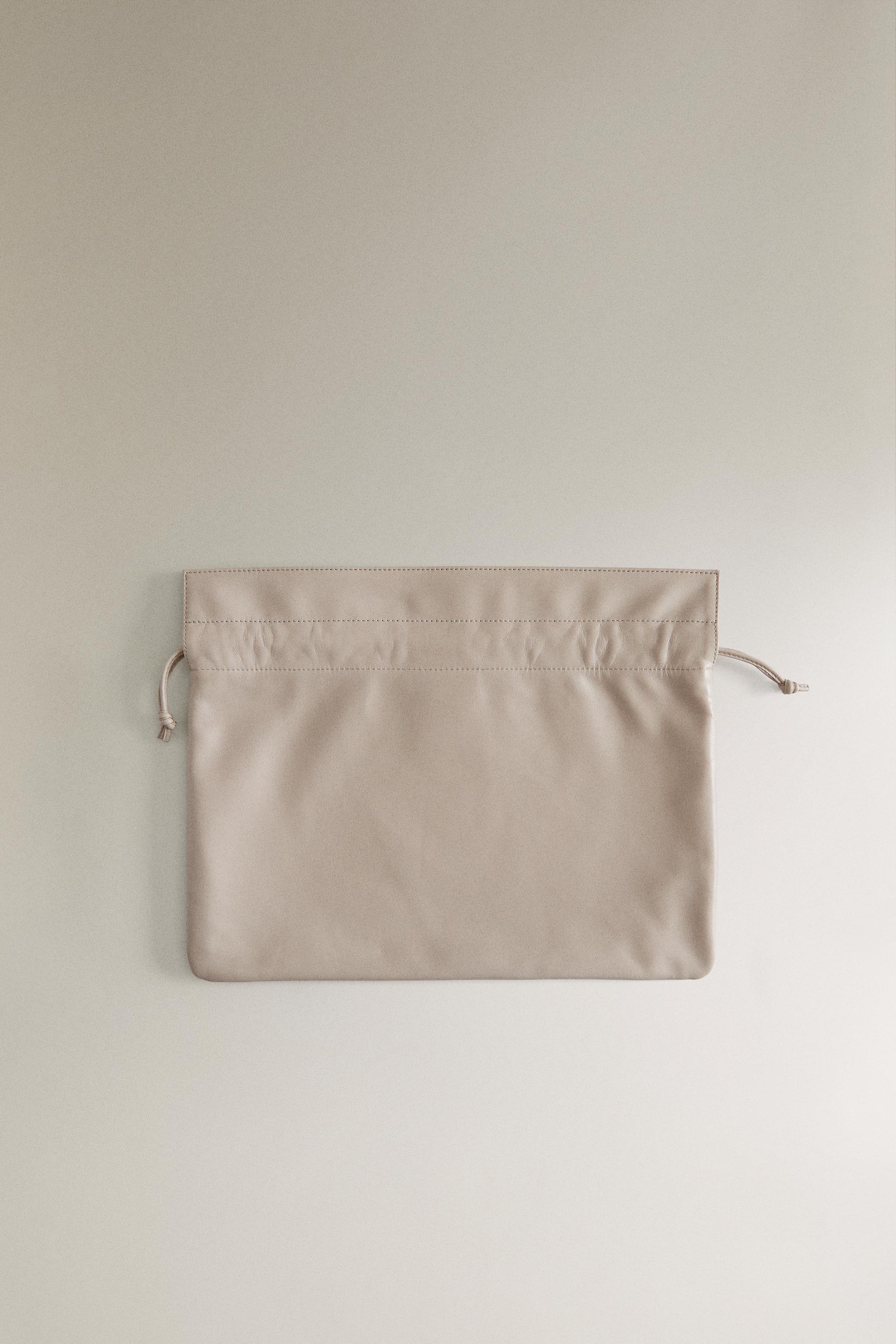 GRAND SAC POCHETTE EN CUIR