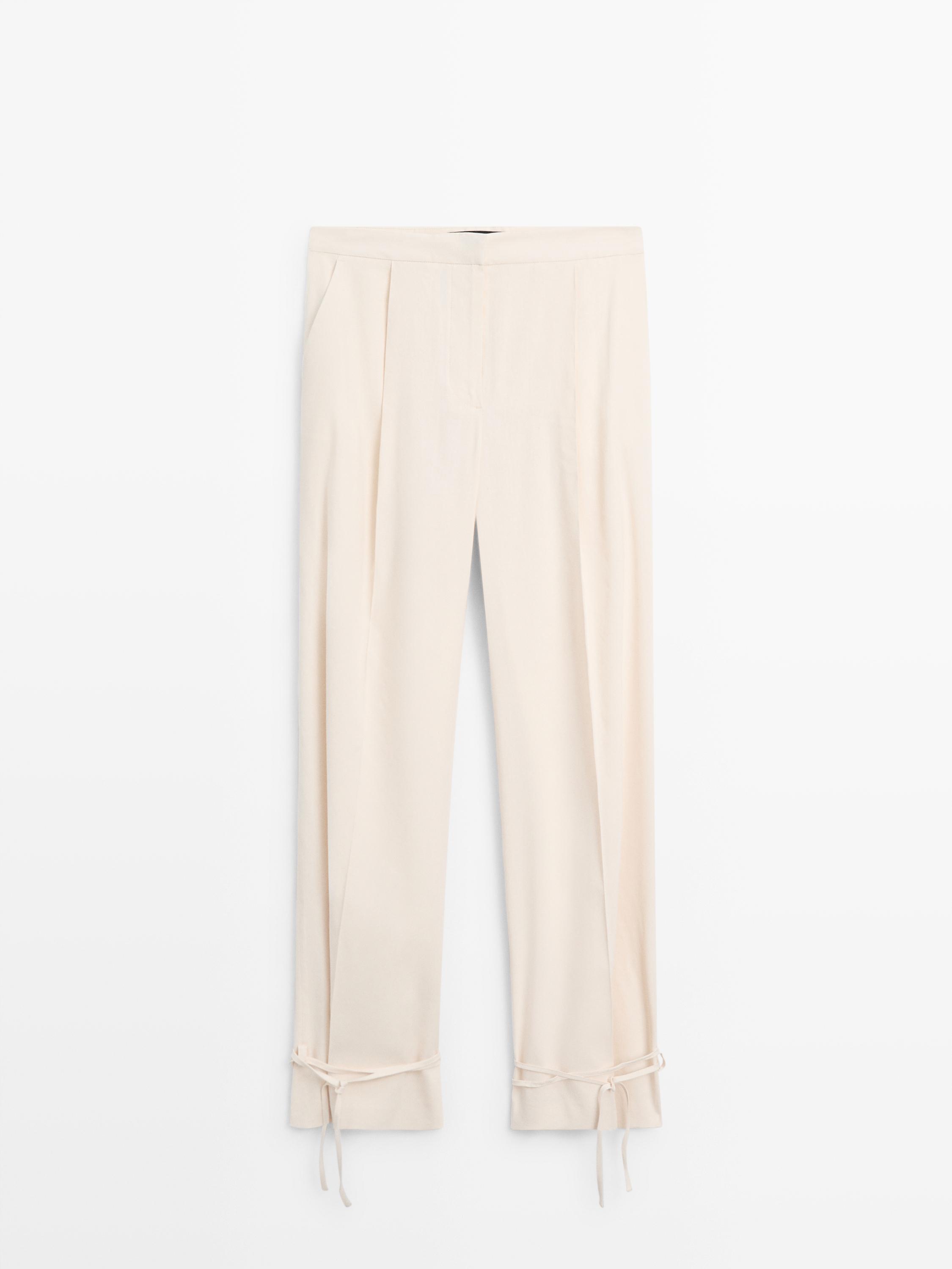 Flowing barrel fit trousers — Ecru