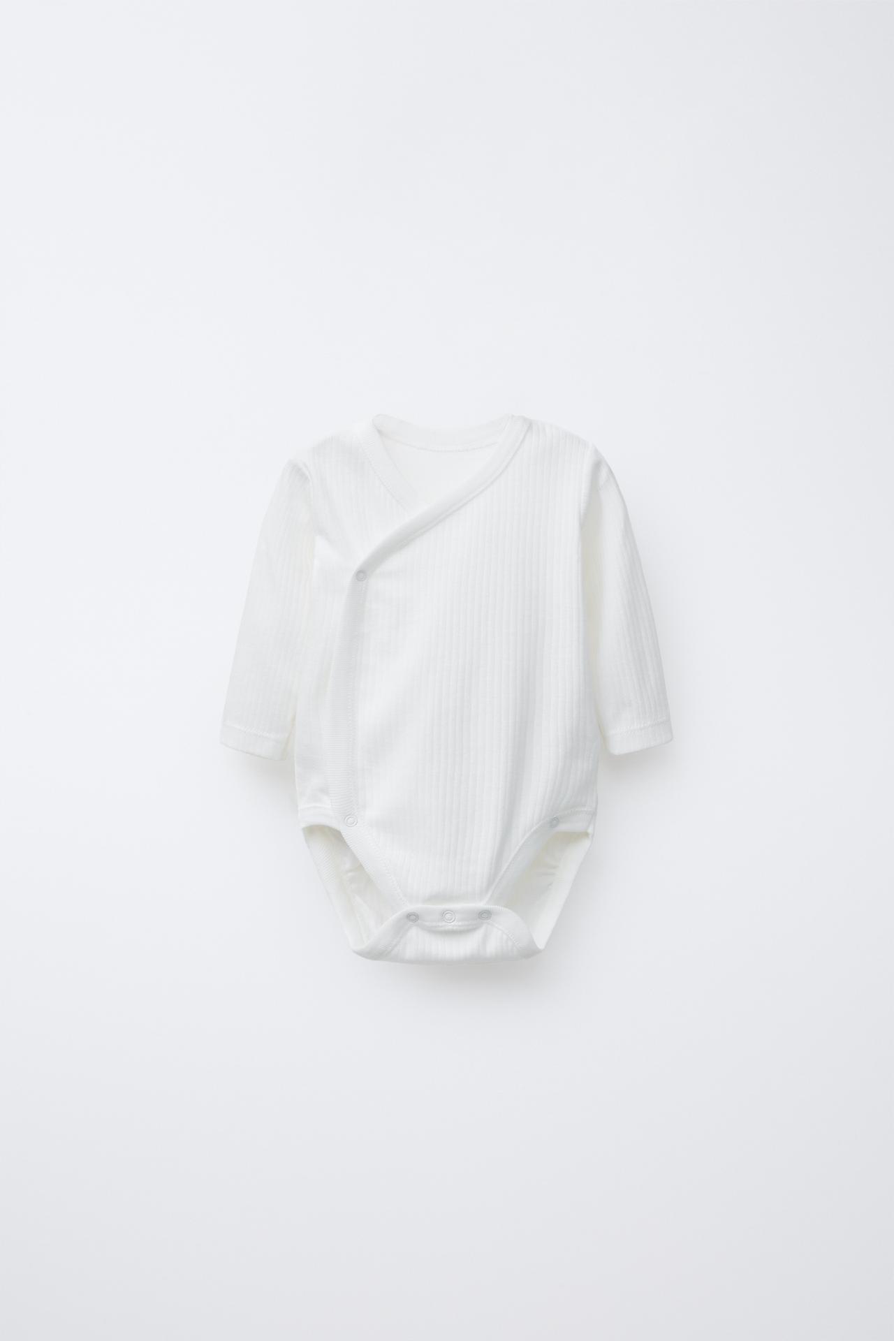 THREE-PACK OF LONG SLEEVE WRAP NECK BODYSUITS — Oyster-white
