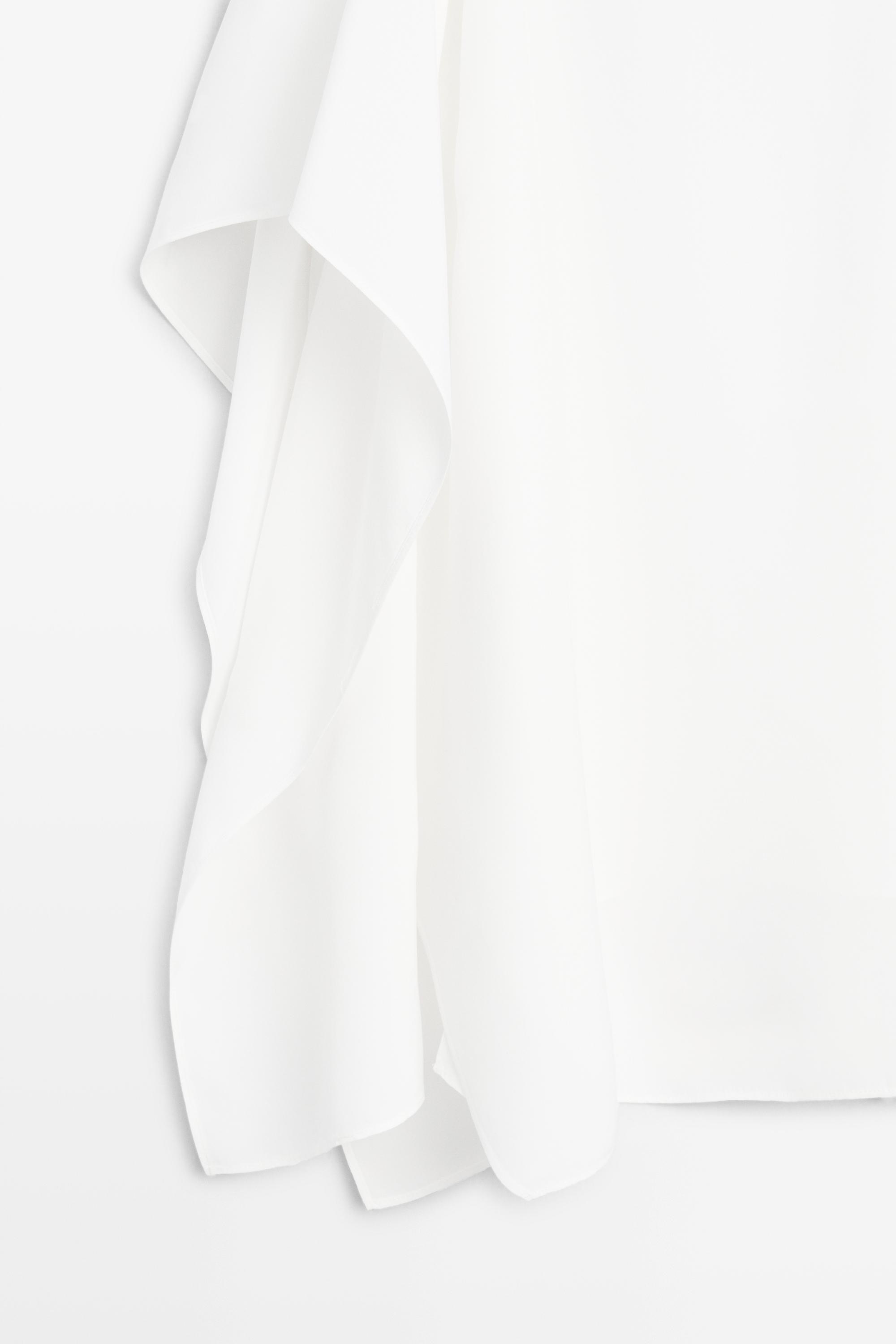 Flowing spaghetti strap top
