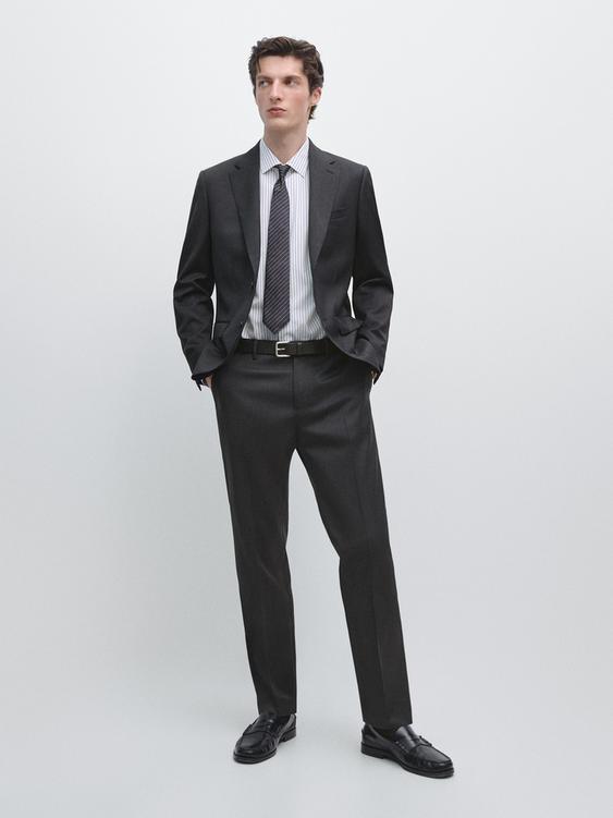 100% cool wool suit blazer from Zara - $420
