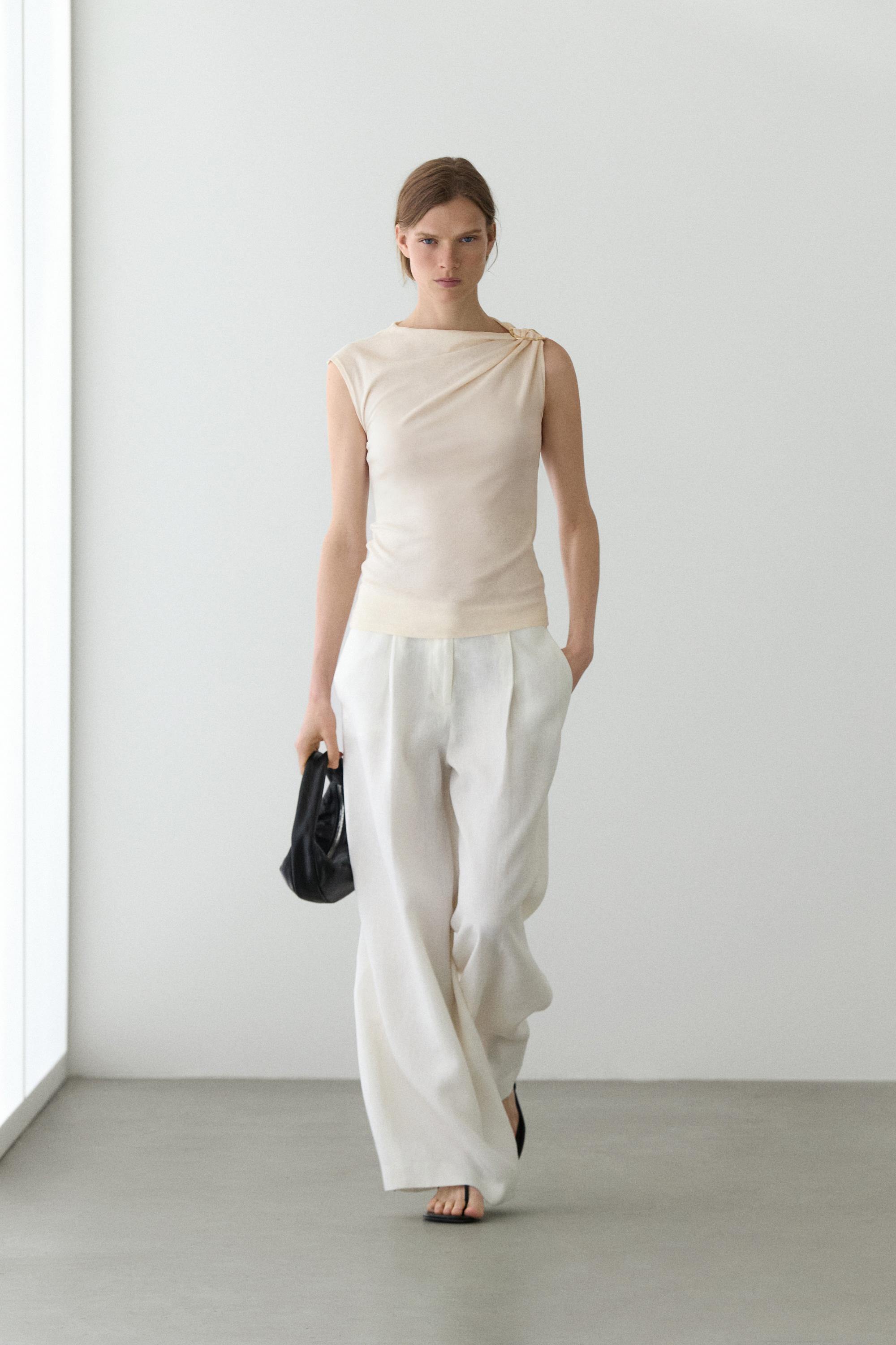 Asymmetric top with rhinestone detail