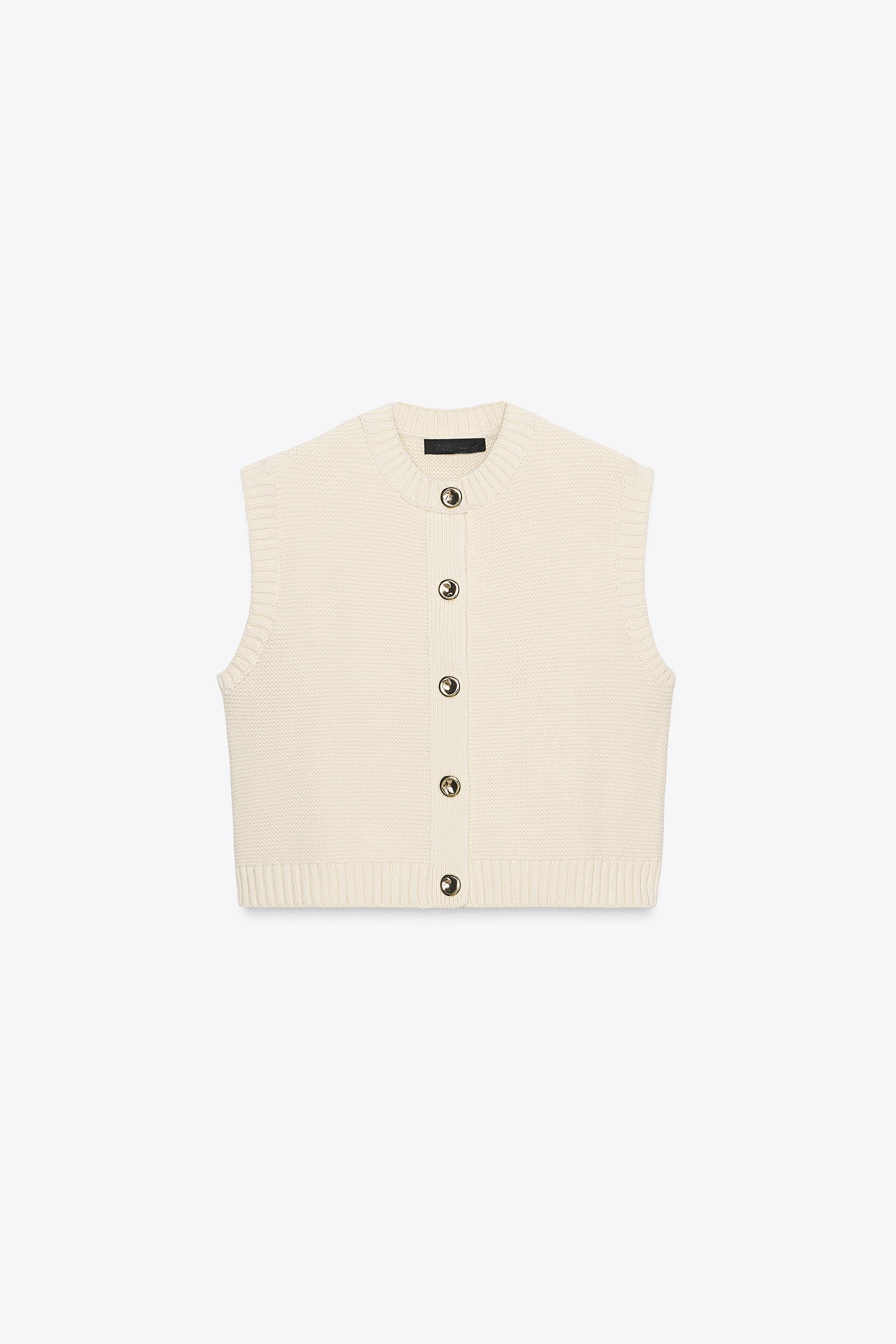GILET EN MAILLE AVEC BOUTON DORÉ