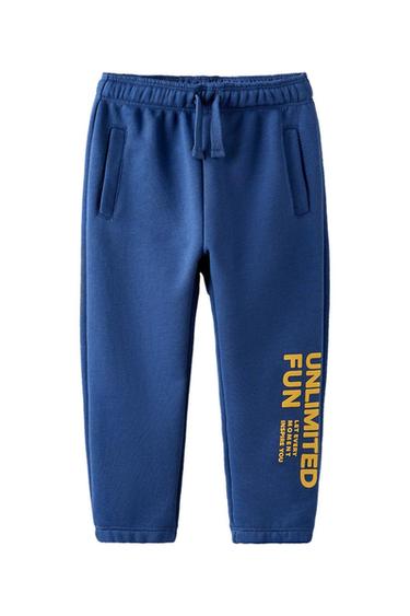 PLUSH TROUSERS WITH RAISED SLOGAN