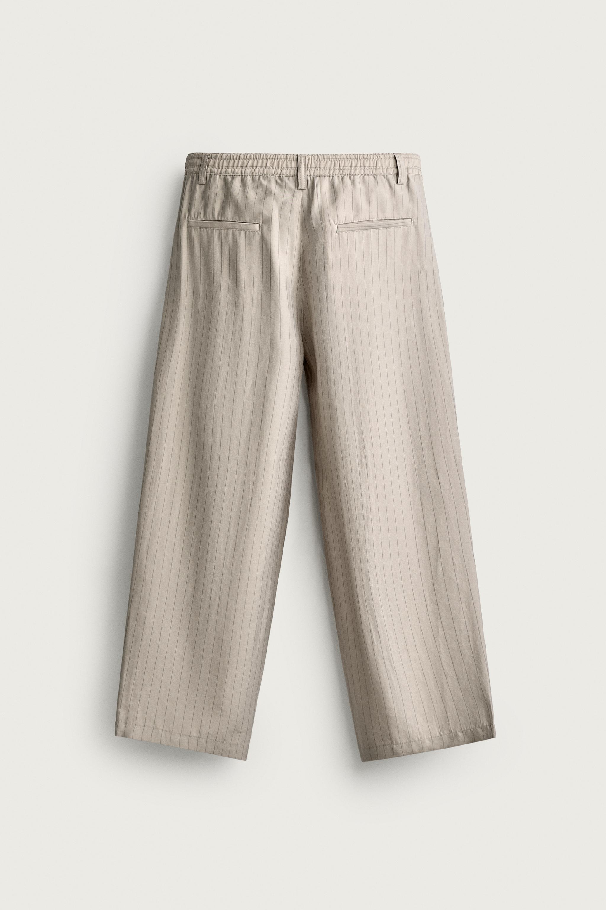 FLOWY SIDE PLEAT PANTS