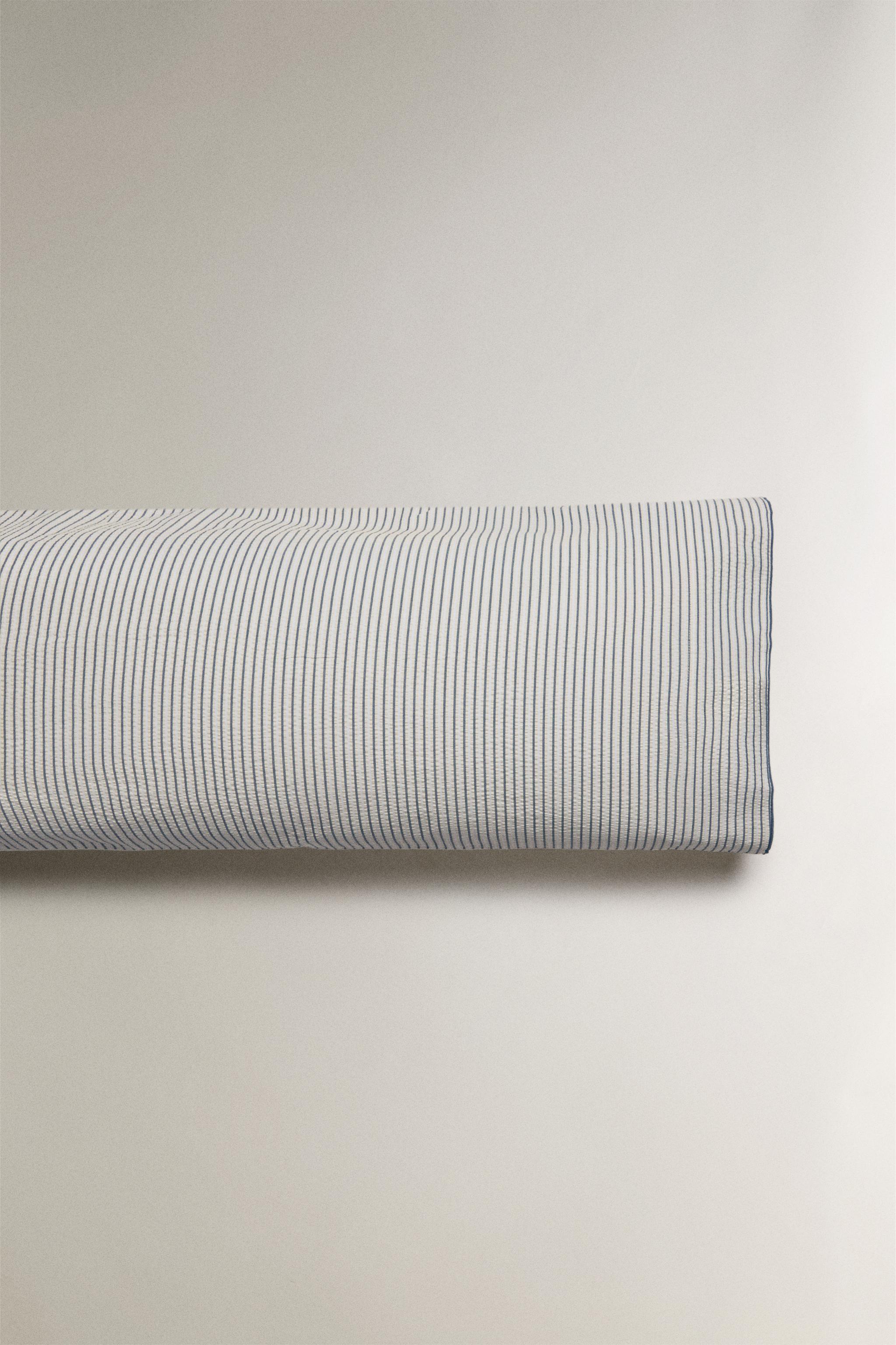 STRIPED SEERSUCKER PILLOWCASE WITH PIPING