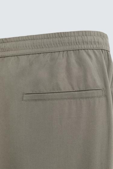 RELAXED FIT FLOWING TROUSERS - Light khaki by Zara - Image 8