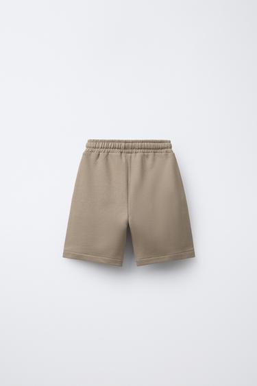 BERMUDA DE JOGGING LISERÉS CONTRASTE - Beige de Zara - Image 1